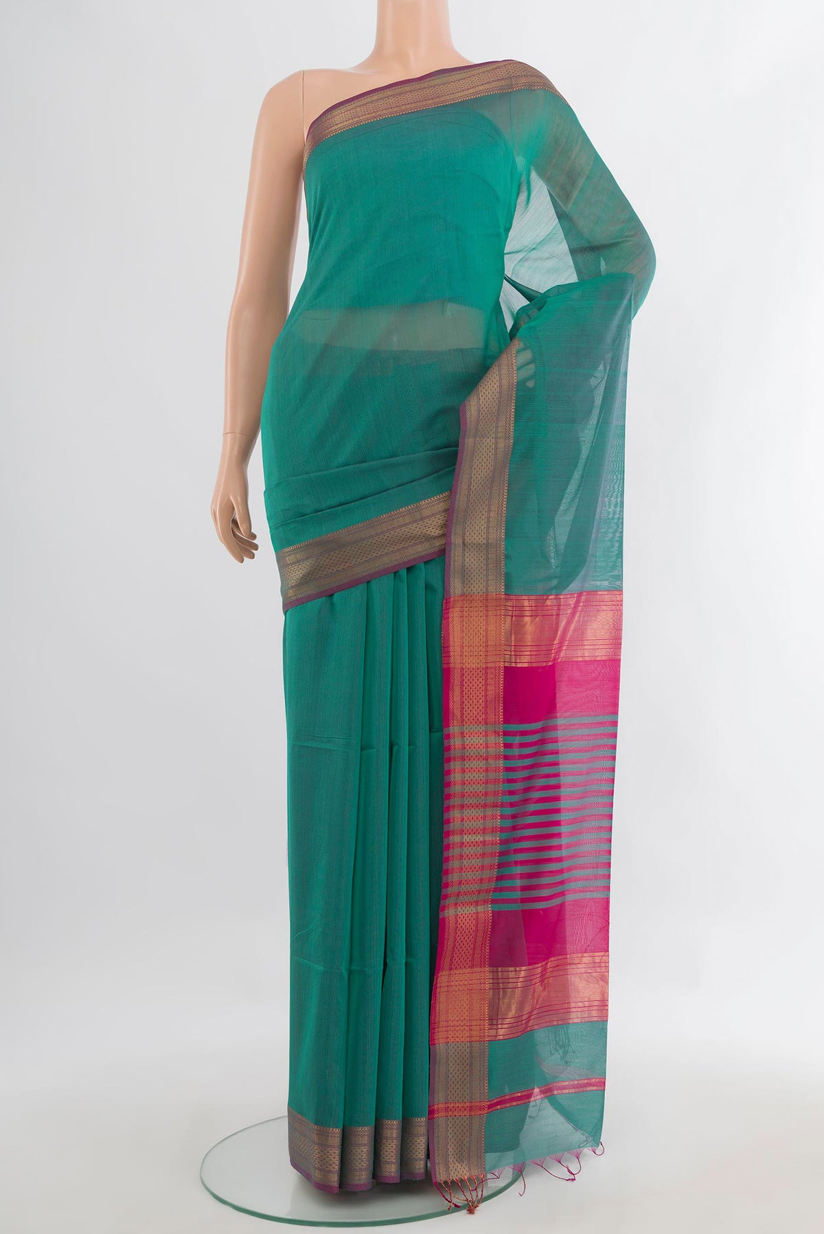 Turquoise Maheshwari Cotton Saree with Plain Body and Zari Border.  displayed on a mannequin