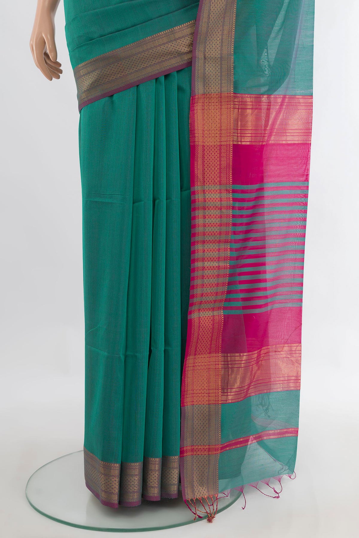 Pleats and pallu of Turquoise Maheshwari Cotton Saree with Plain Body and Zari Border. 