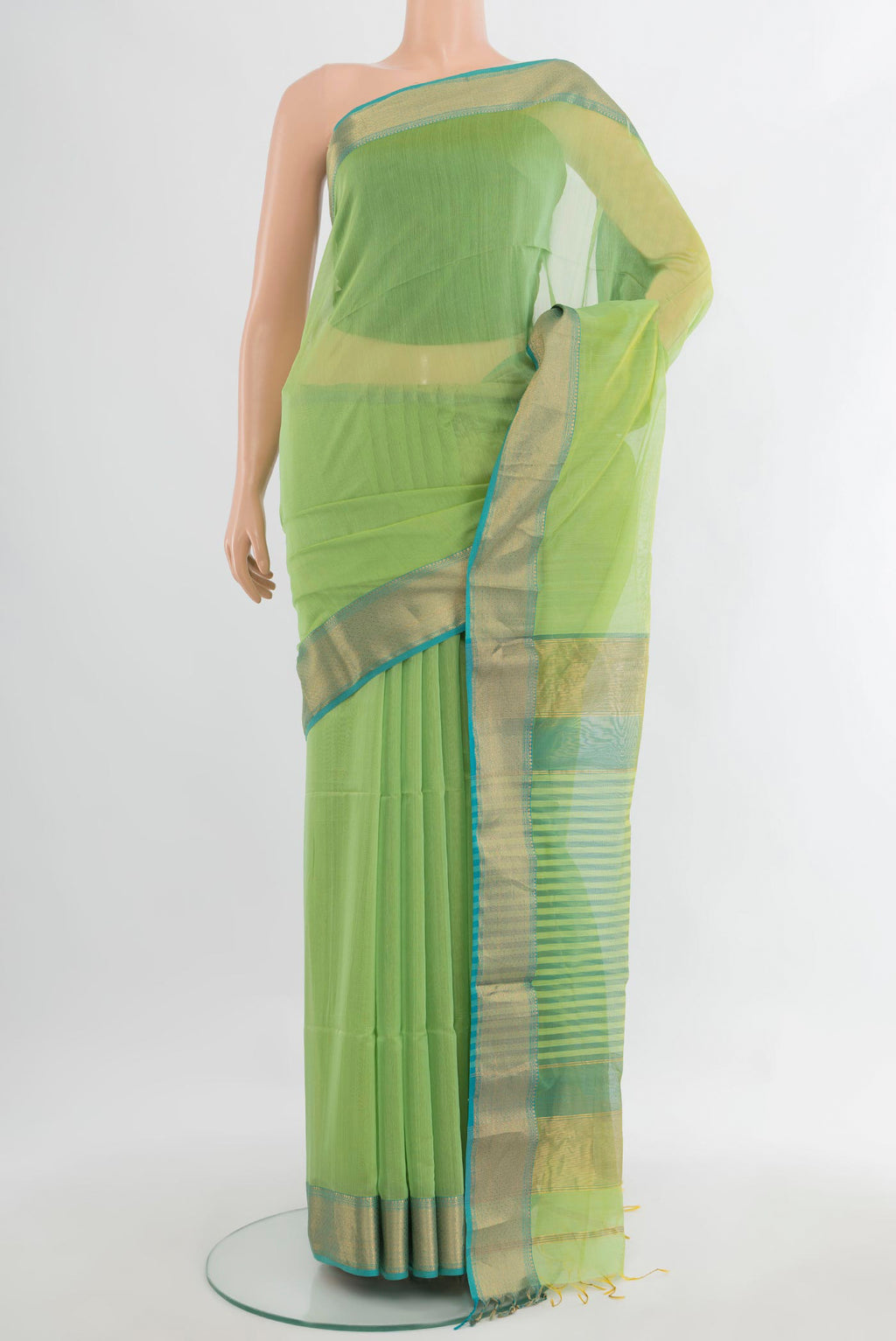 Light Green Maheshwari Cotton Saree with Plain Body and Zari Border.  displayed on a mannequin