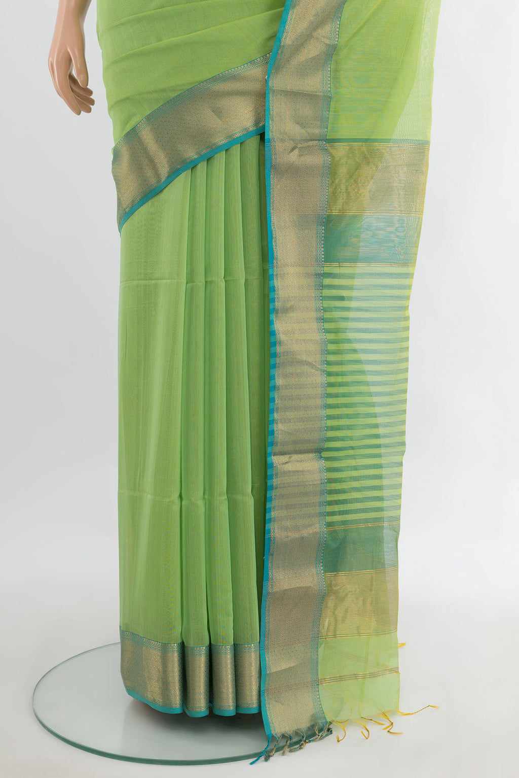 Pleats and pallu of Light Green Maheshwari Cotton Saree with Plain Body and Zari Border. 