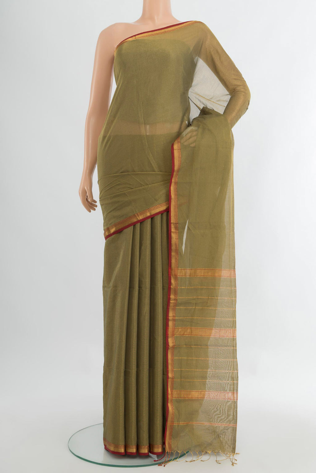 Golden Maheshwari Silk Cotton Saree with Zari Butta on the body and Silk Border.  displayed on a mannequin