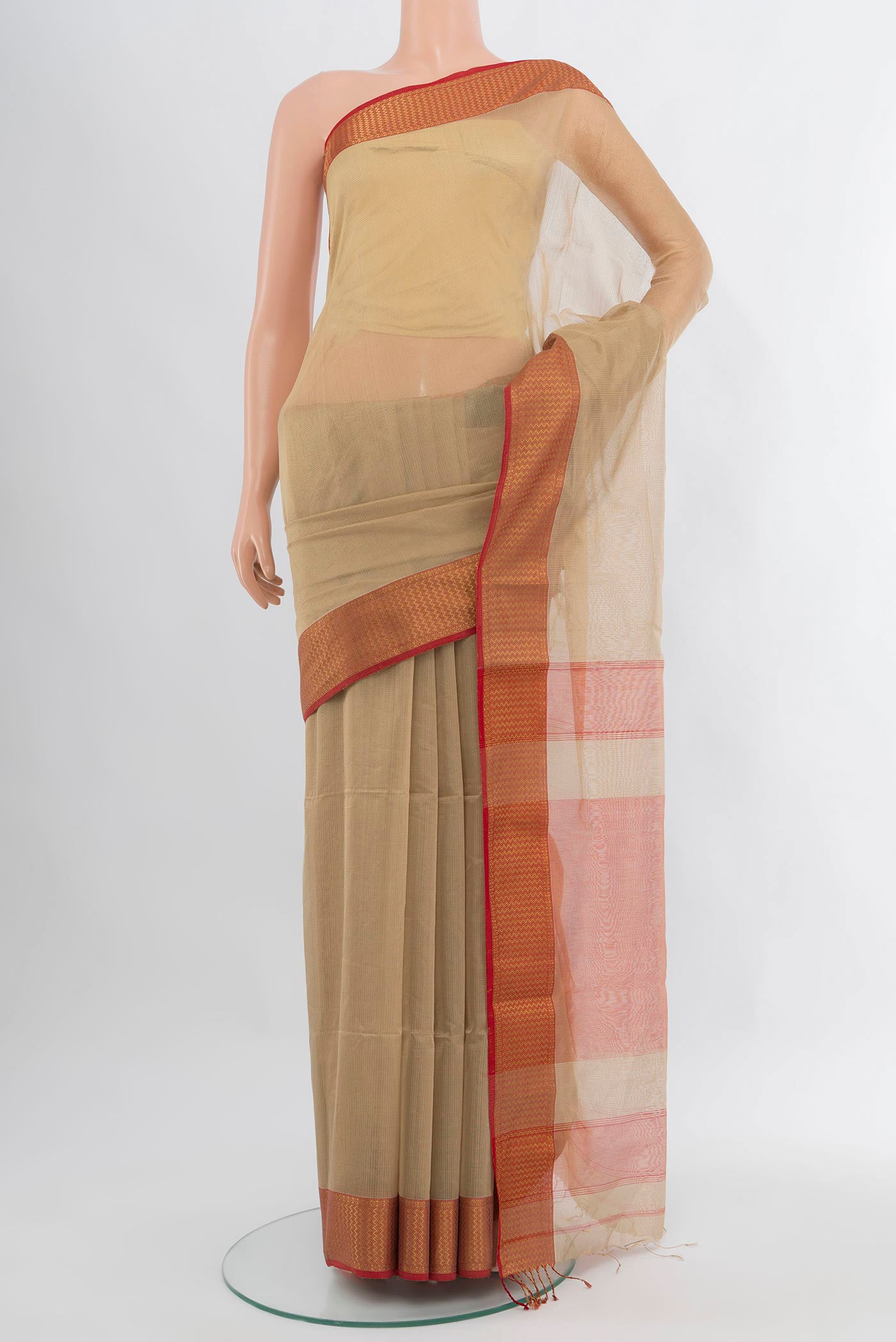Dark Beige Maheshwari Silk Cotton Saree with Plain Body and Zari Border.  displayed on a mannequin