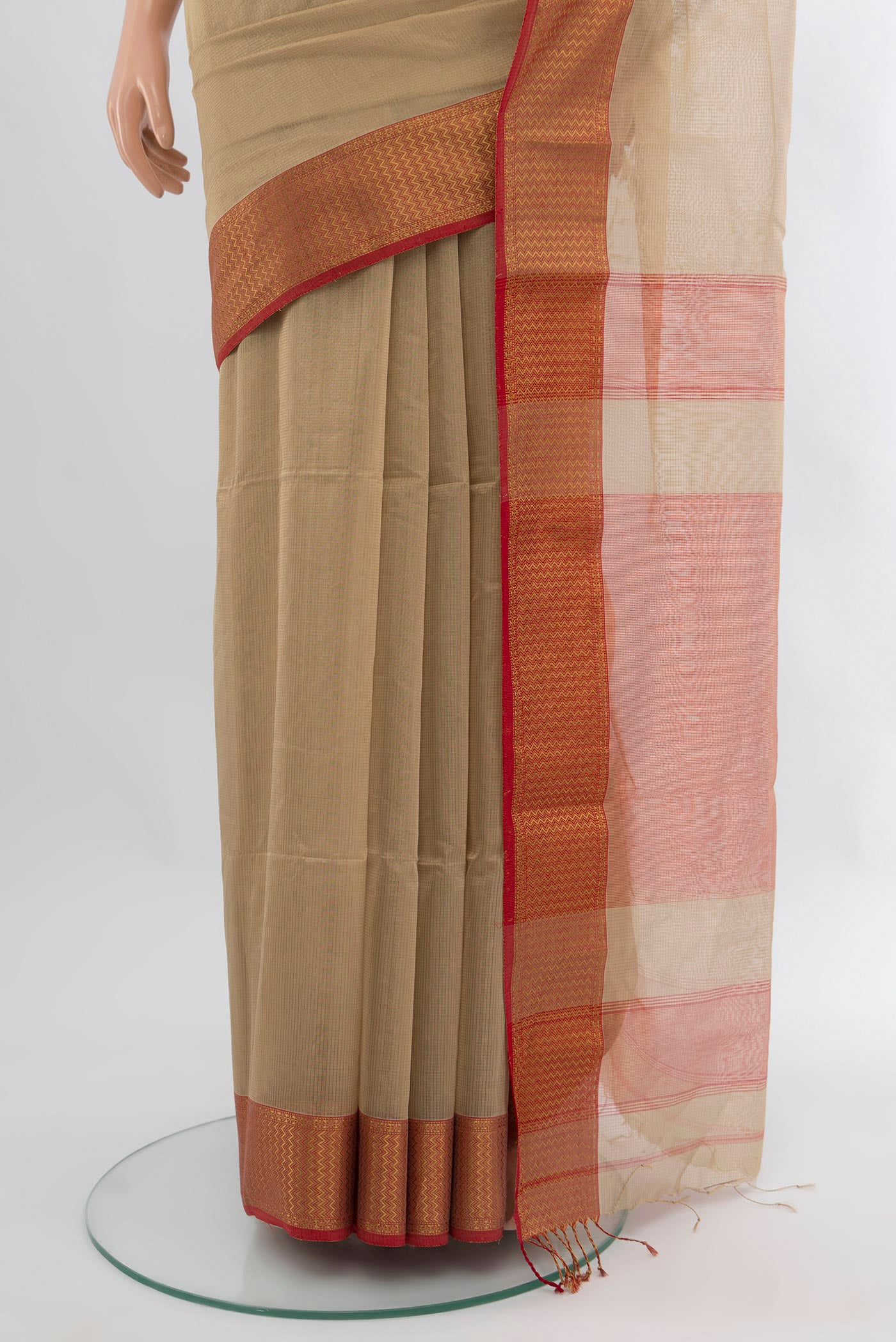 Pleats and pallu of Dark Beige Maheshwari Silk Cotton Saree with Plain Body and Zari Border. 