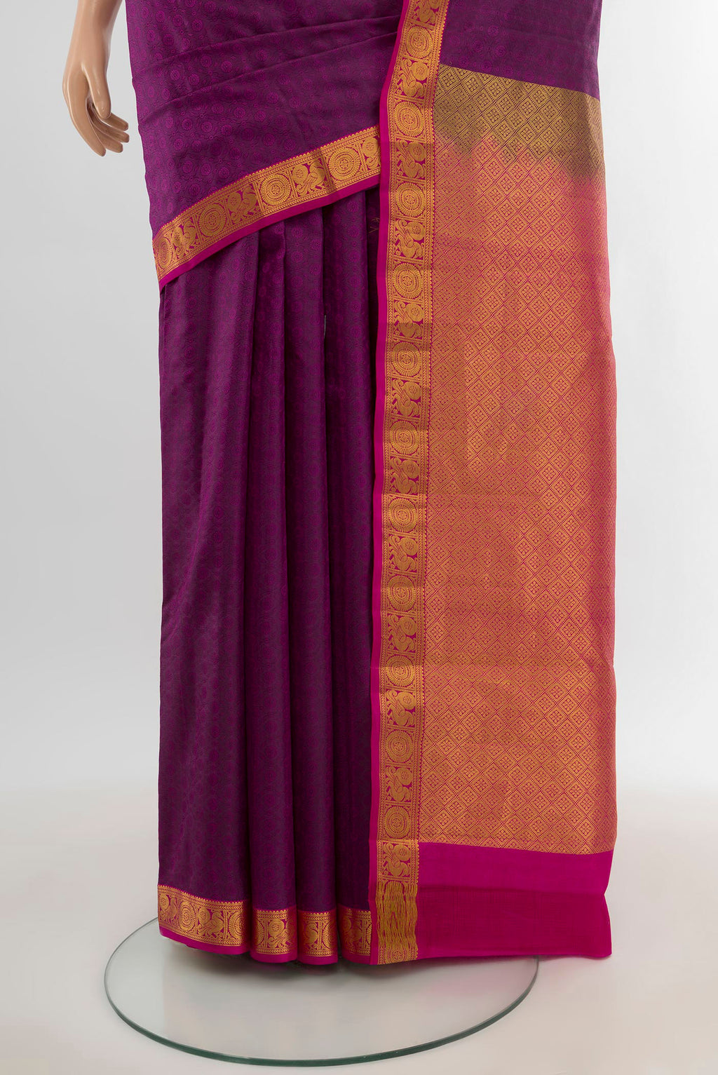Pleats and pallu of Purple Kanjivaram Silk Saree with Jacquard design on the body and Zari Border. 