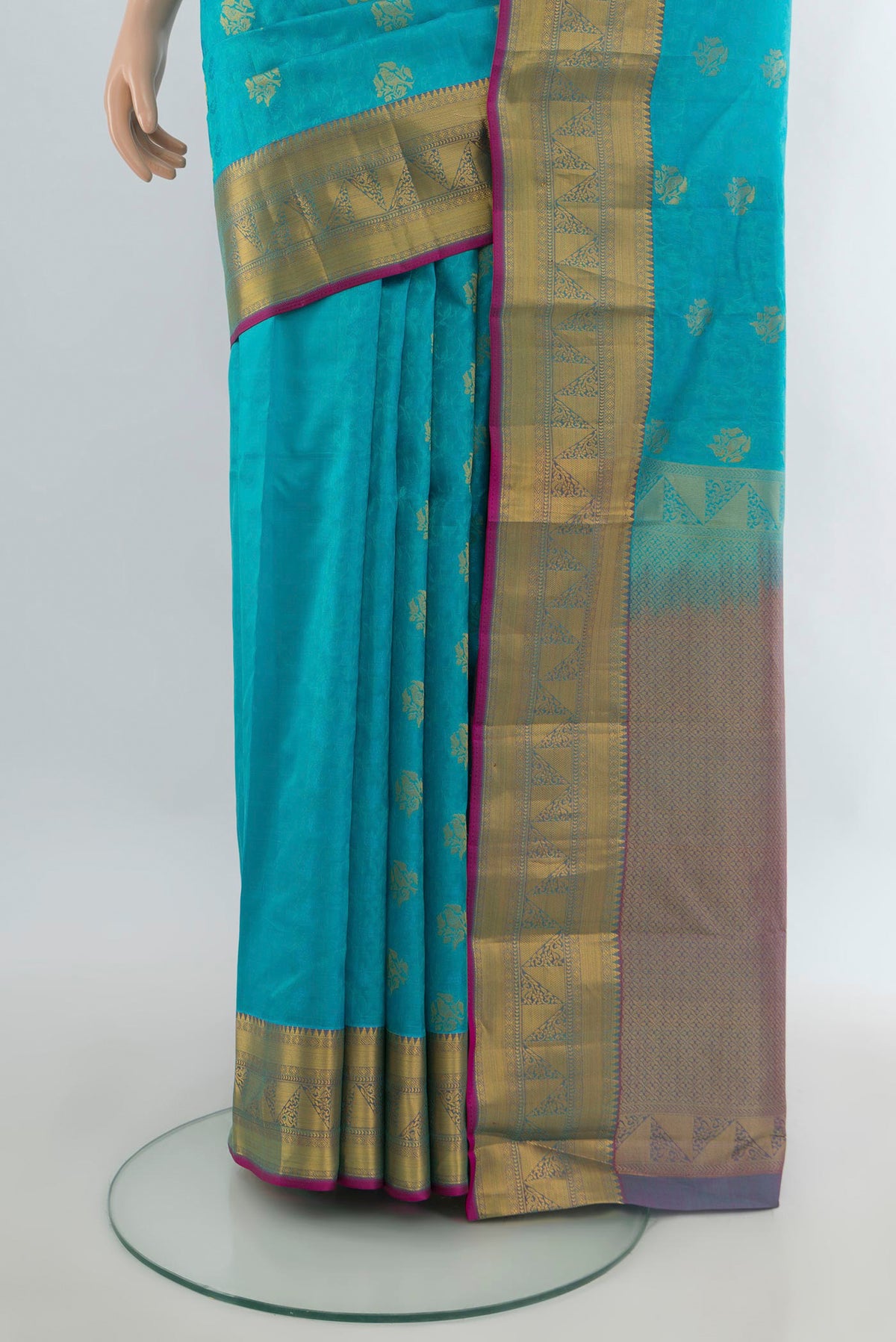 Pleats and pallu of Pure Silk Light Blue Kanchipuram Saree with Jacquard With Zari Butta on the body and Zari Border. 
