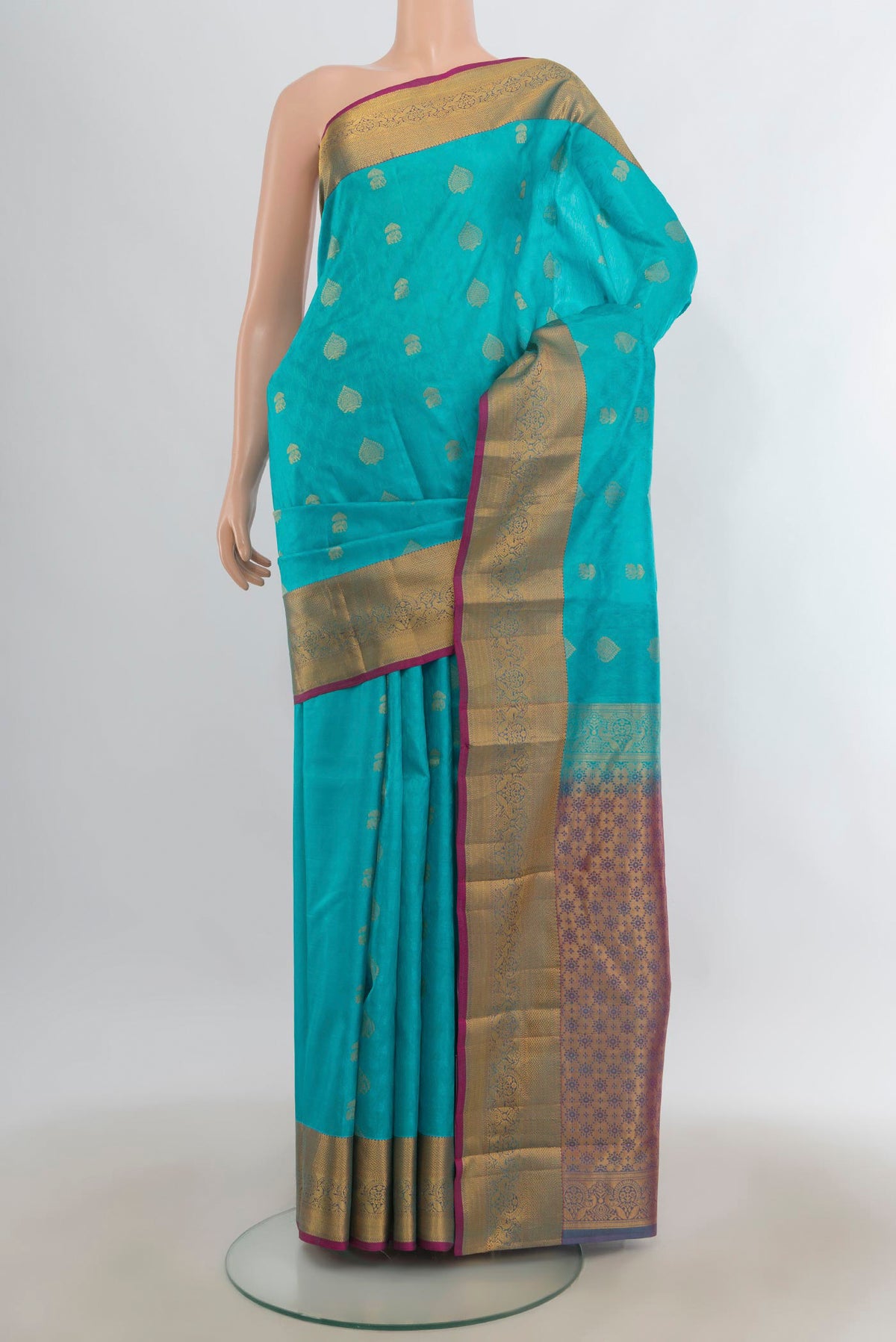Pure Silk Light Blue Kanchipuram Saree with Jacquard With Zari Butta on the body and Zari Border.  displayed on a mannequin