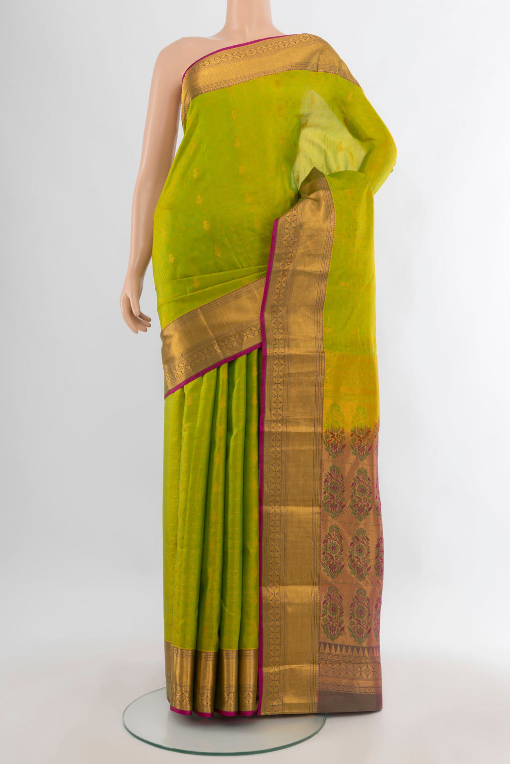 Pure Silk Parrot Green Kanchipuram Saree with Jacquard With Zari Butta on the body and Zari Border.  displayed on a mannequin
