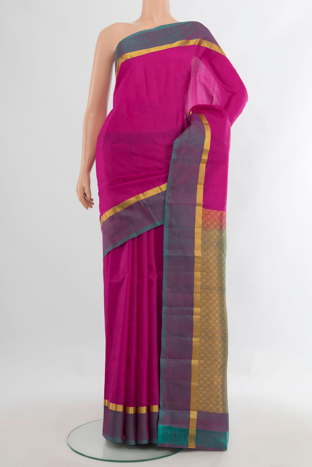Pure Silk Pink Kanjivaram Saree with Jacquard design on the body and Zari Border.  displayed on a mannequin