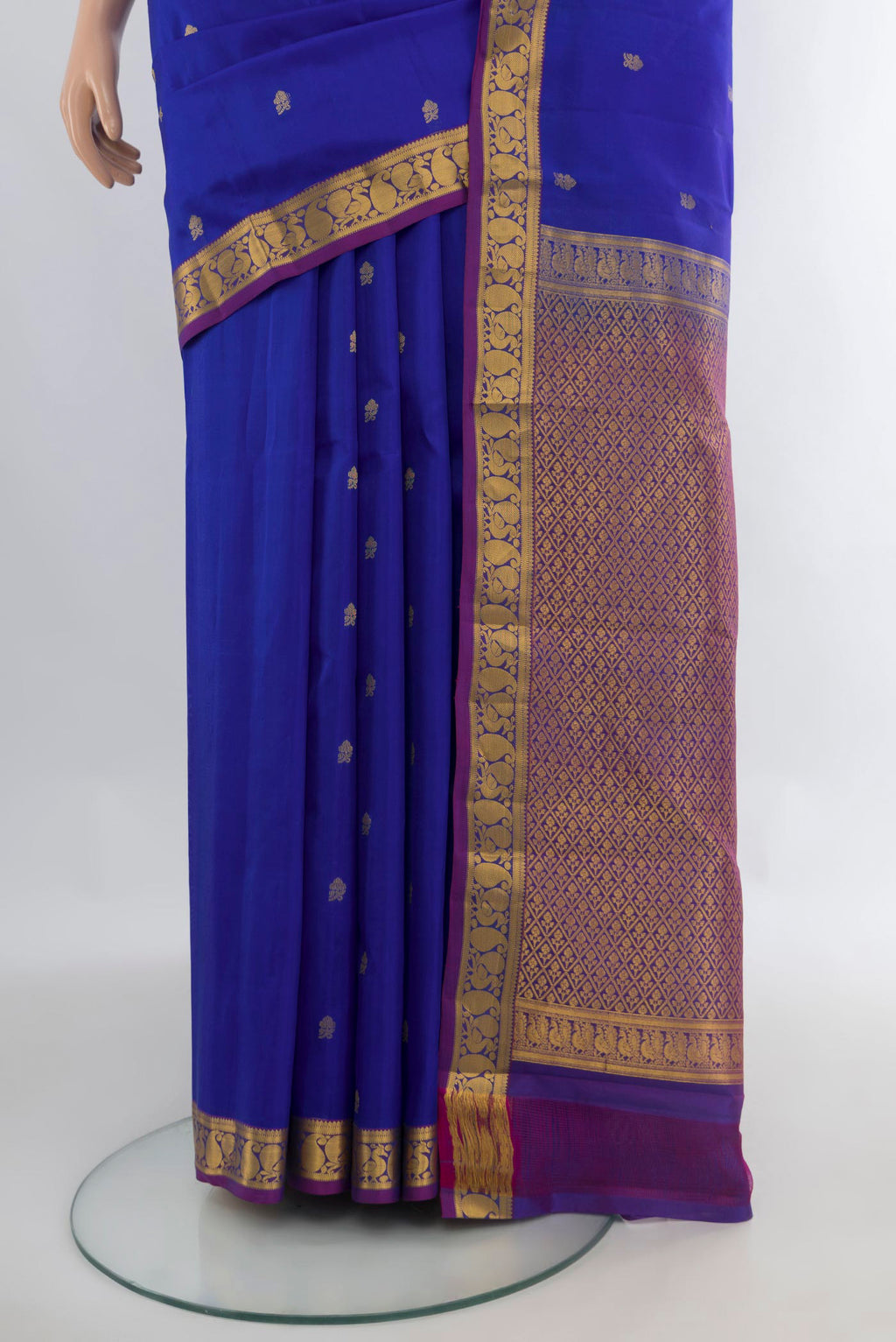 Pleats and pallu of Pure Silk Royal Blue Kanjivaram Saree with Zari Butta on the body and Zari Border. 