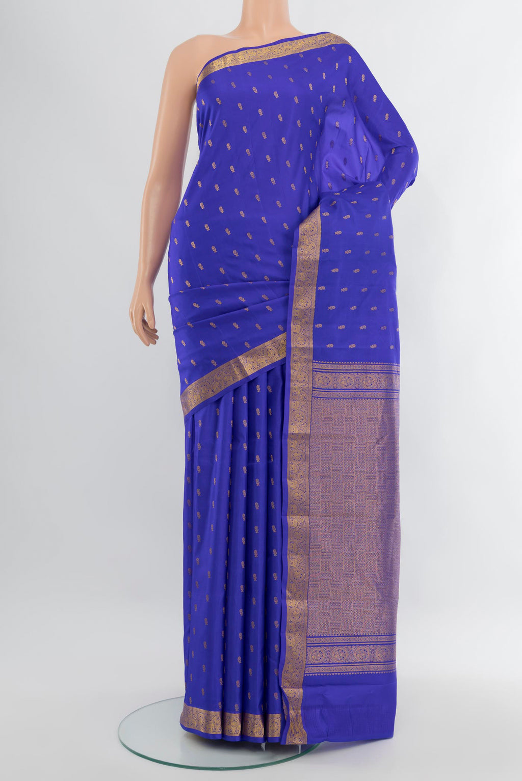 Royal Blue Kanchipuram Silk Saree with Zari Butta on the body and Zari Border.  displayed on a mannequin
