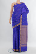 Royal Blue Kanchipuram Silk Saree with Zari Butta on the body and Zari Border.  displayed on a mannequin
