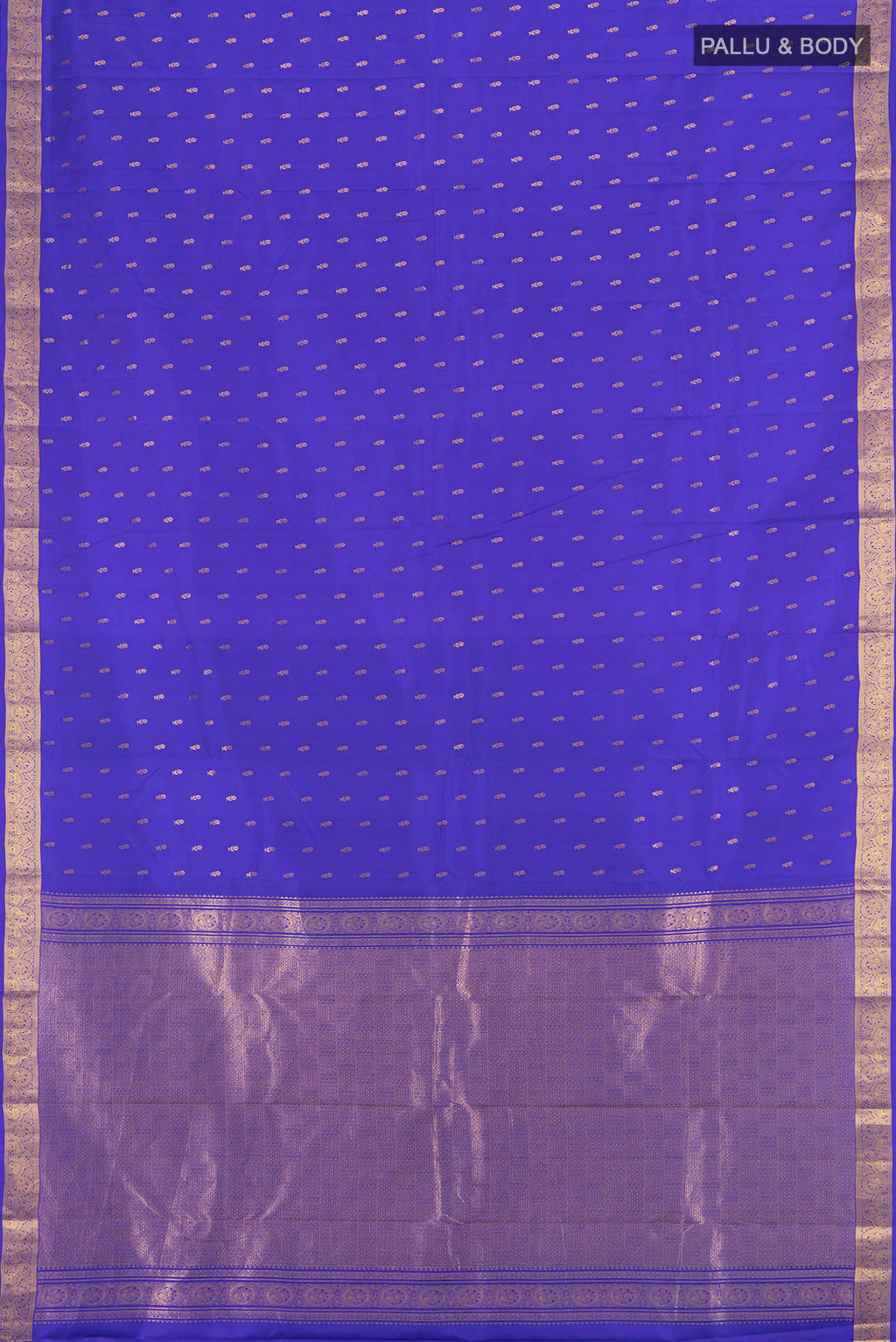 Flat view of Royal Blue Kanchipuram Silk Saree with Zari Butta on the body and Zari Border. 
