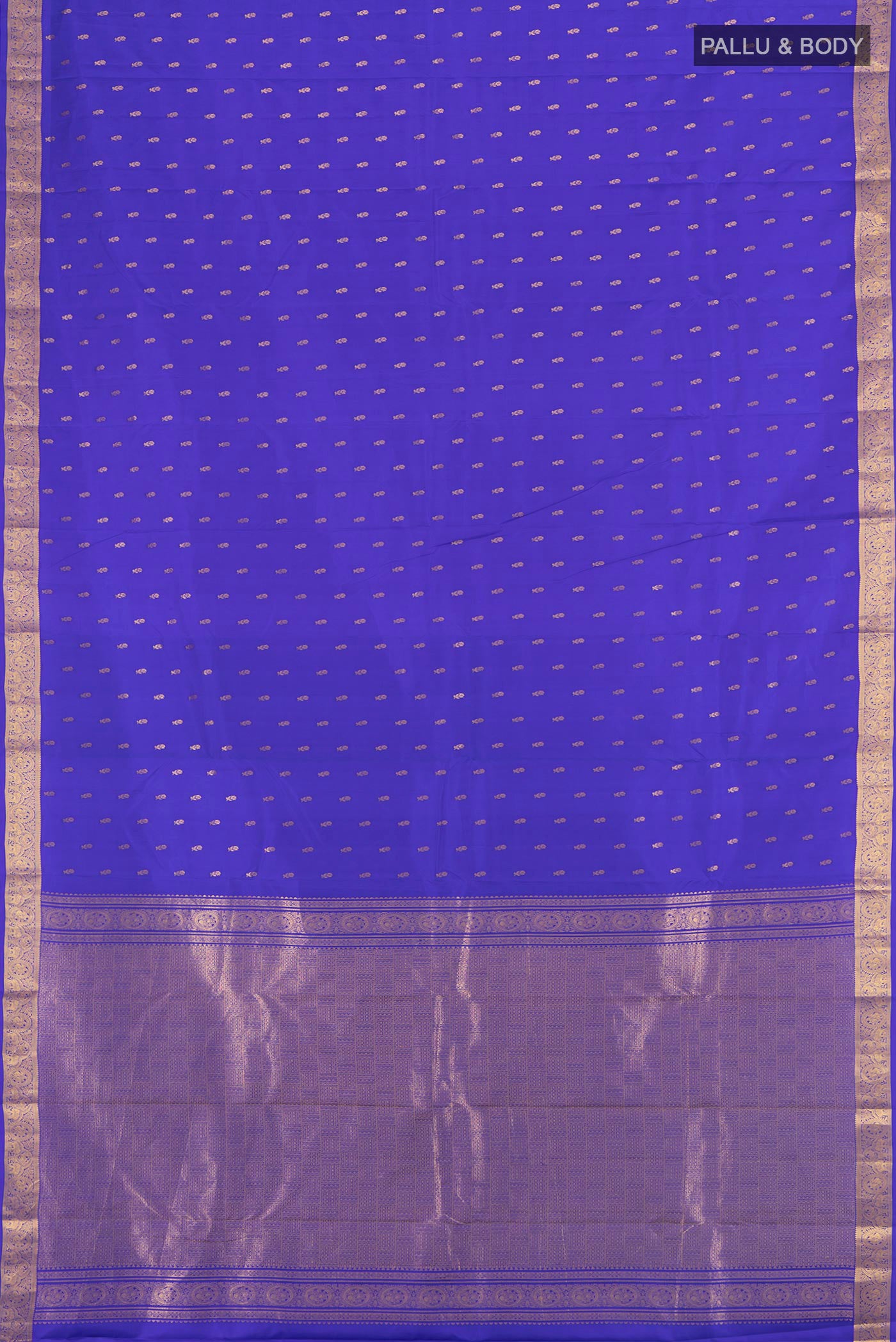Flat view of Royal Blue Kanchipuram Silk Saree with Zari Butta on the body and Zari Border. 