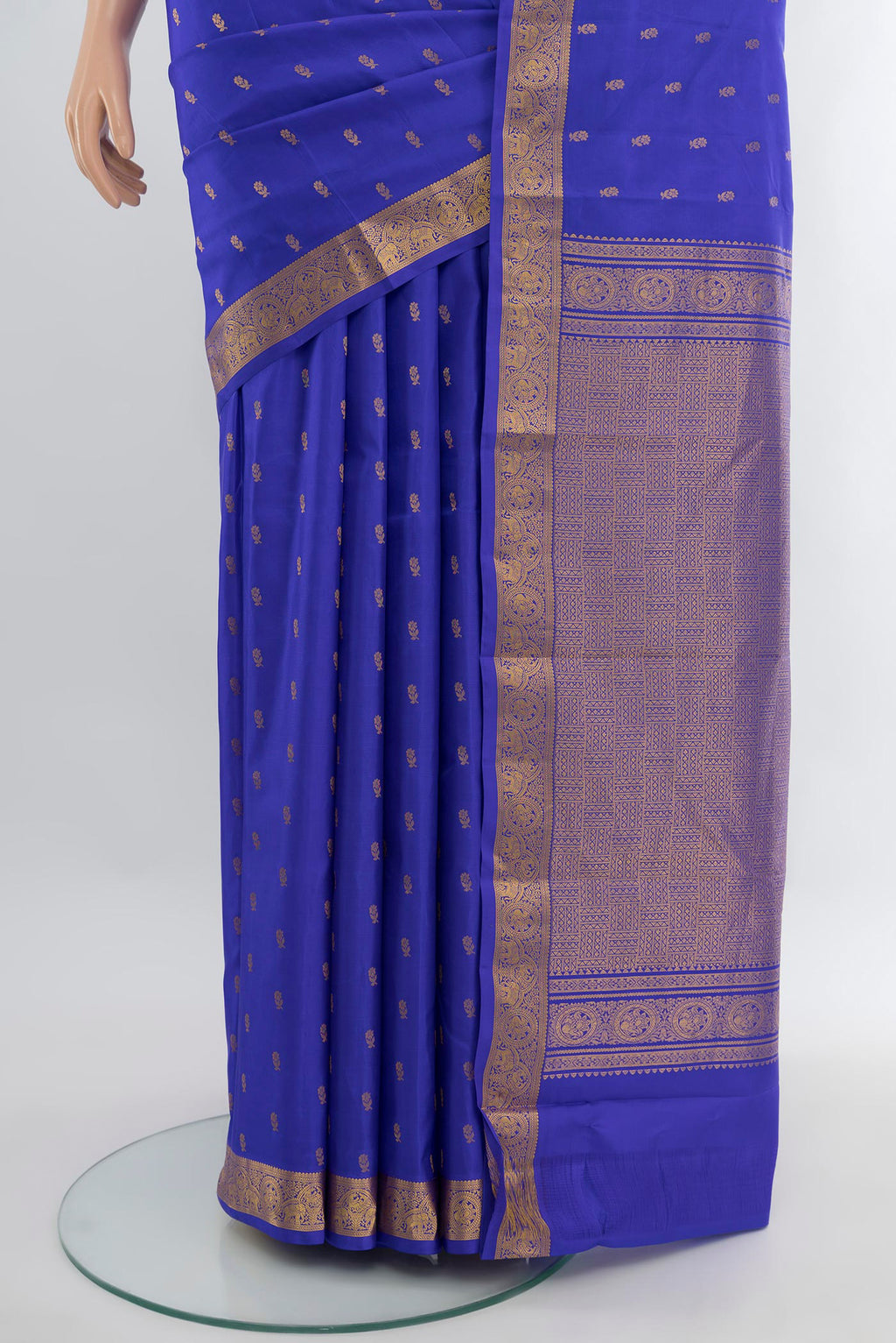 Pleats and pallu of Royal Blue Kanchipuram Silk Saree with Zari Butta on the body and Zari Border. 