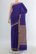 Pure Silk Dark Blue Kanchipuram Saree with Zari Butta on the body and Zari Border.  displayed on a mannequin