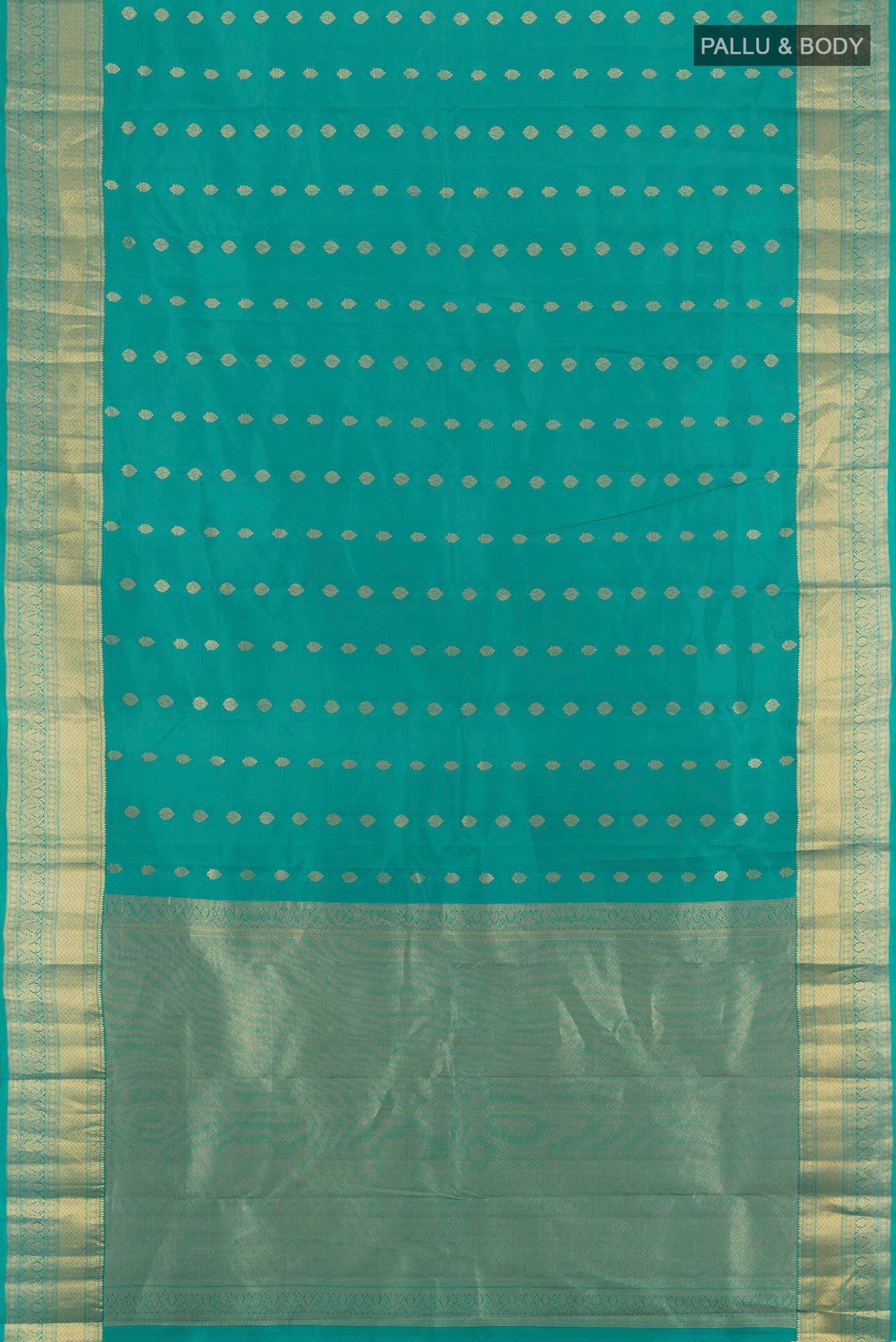 Flat view of Light Blue Kanchipuram Silk Saree with Zari Butta on the body and Zari Border. 