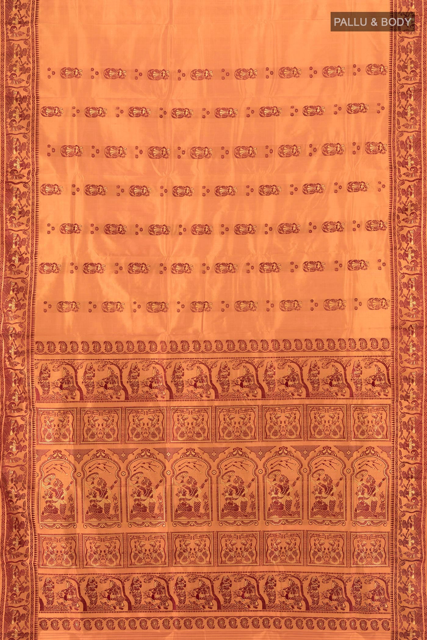 Flat view of Saffron Baluchari Silk Saree with Thread Butta on the body and Thread Border. 