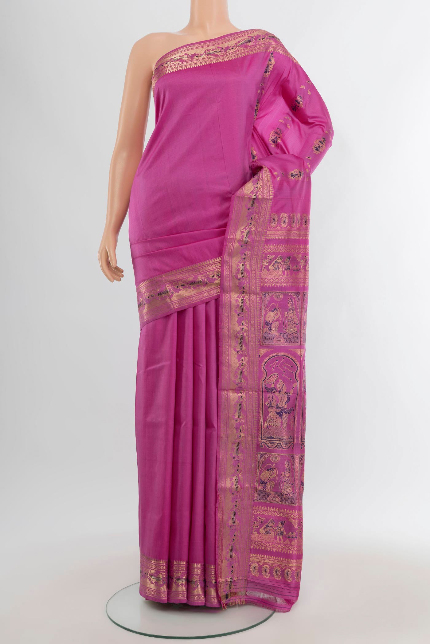 Light Magenta Baluchari Silk Saree with Zari And Thread Butta on the body and Zari Border.  displayed on a mannequin