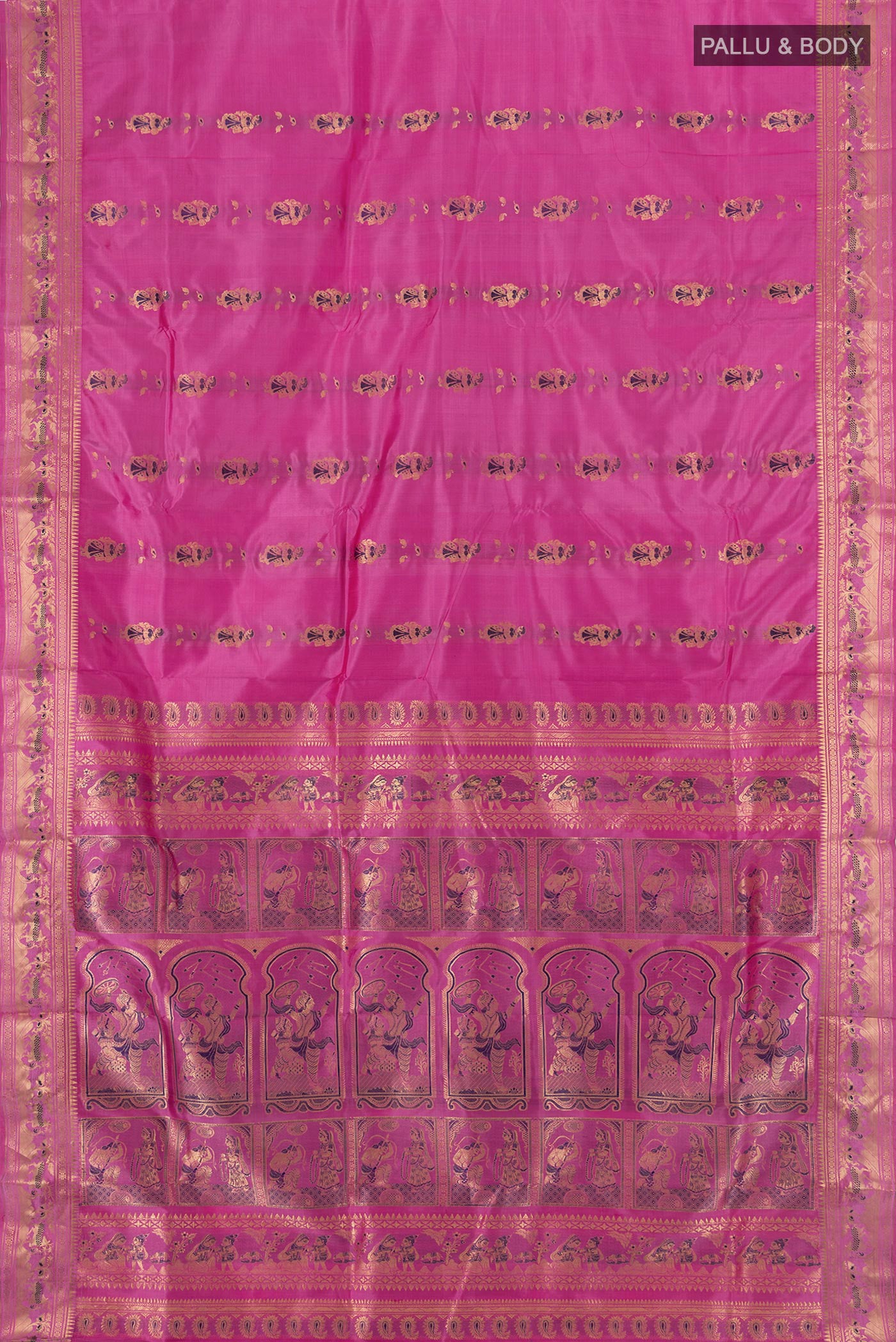 Flat view of Light Magenta Baluchari Silk Saree with Zari And Thread Butta on the body and Zari Border. 