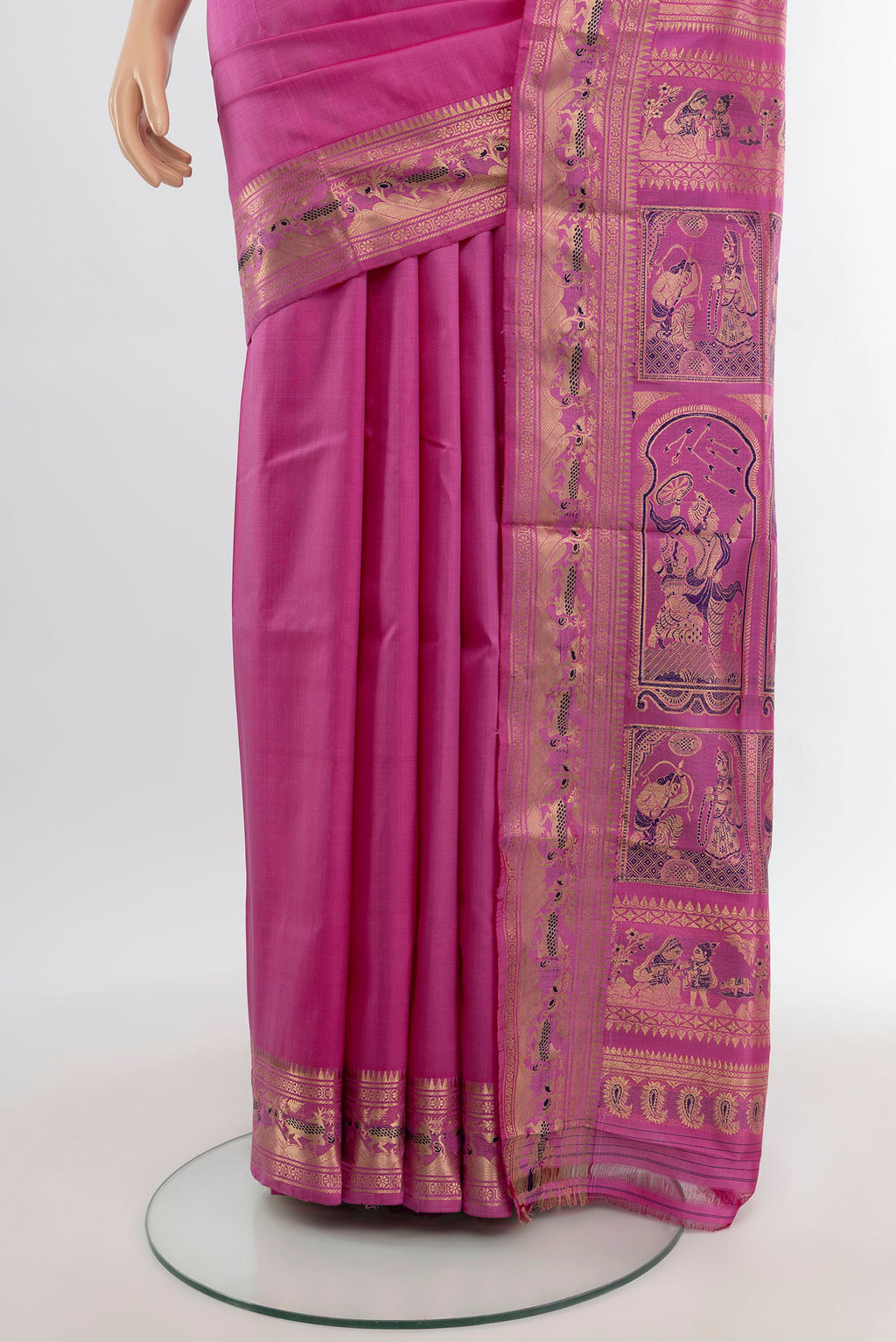 Pleats and pallu of Light Magenta Baluchari Silk Saree with Zari And Thread Butta on the body and Zari Border. 