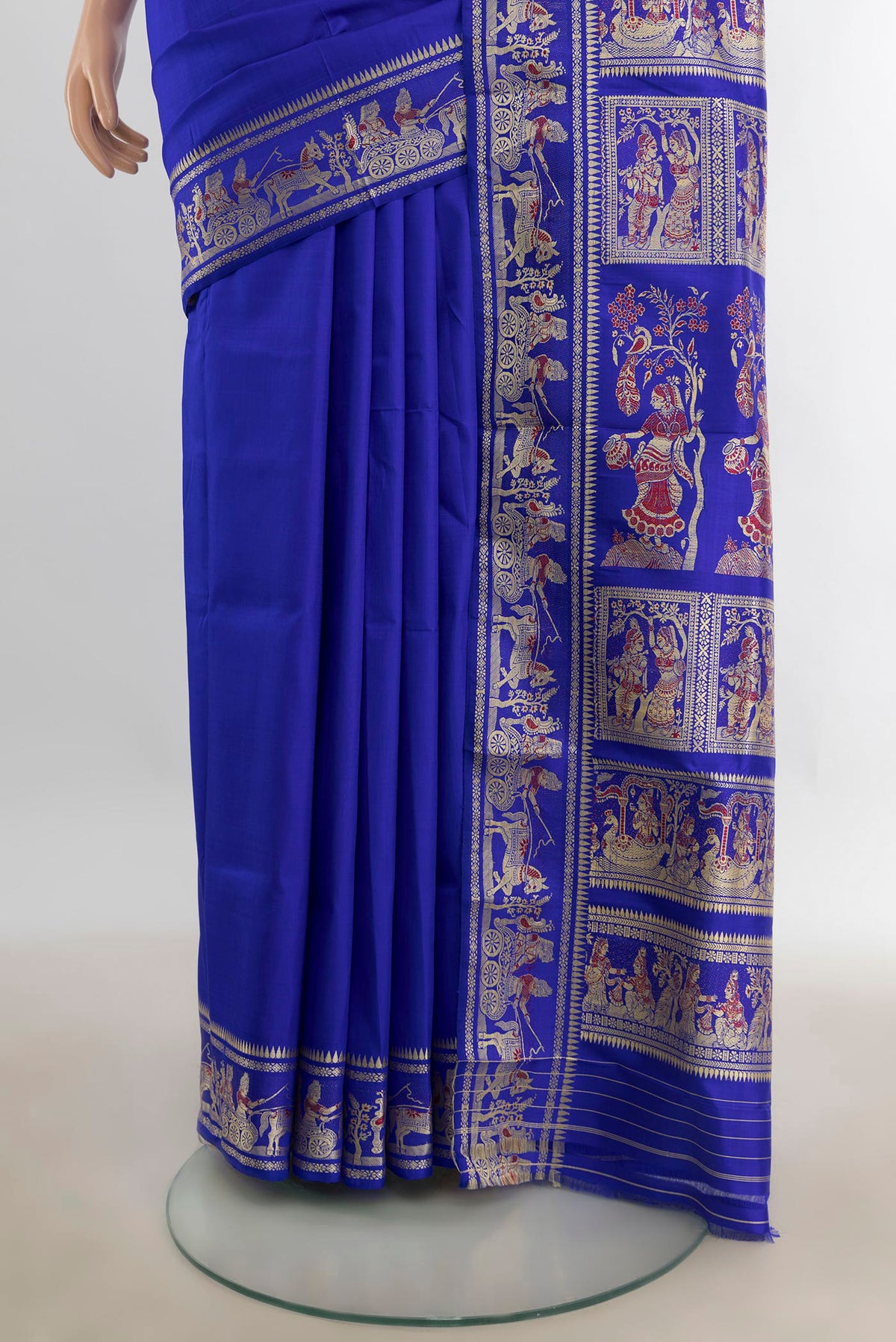 Pleats and pallu of Pure Silk Dark Blue Baluchari Saree with Thread Butta on the body and Silk Border. 