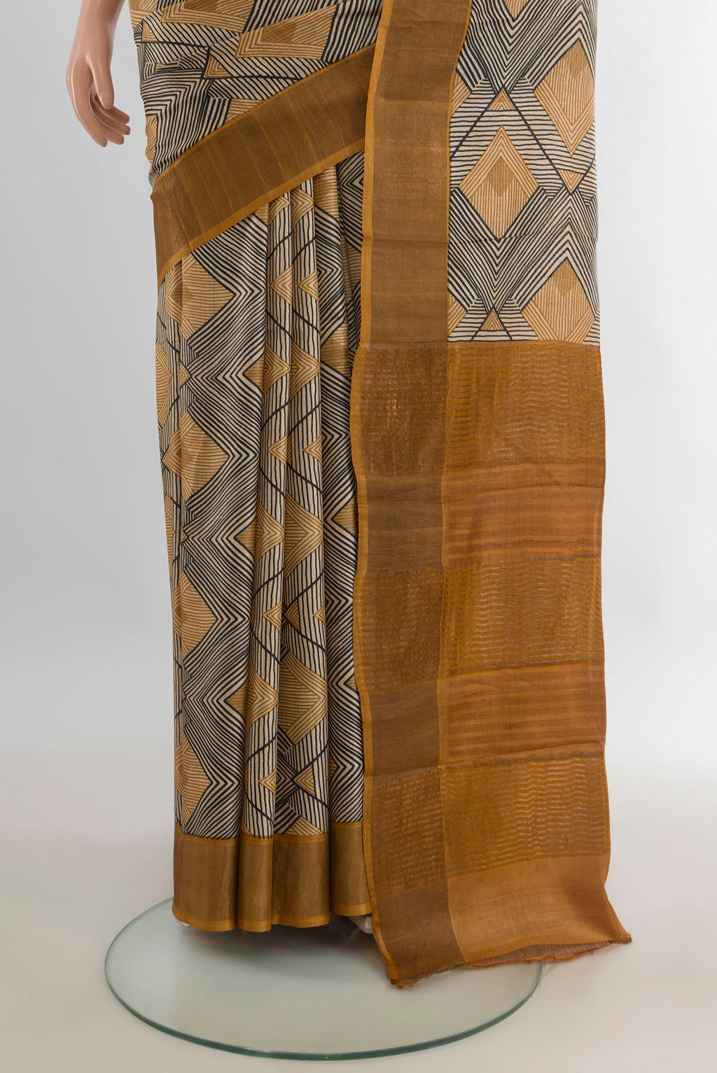Pleats and pallu of Multi Color Tussar Saree with Floral Print on the body and Zari Border. 