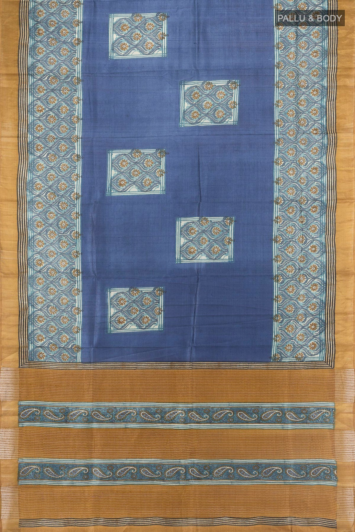 Flat view of Blue Grey Tussar Silk Saree with Floral Print on the body and Zari Border. 
