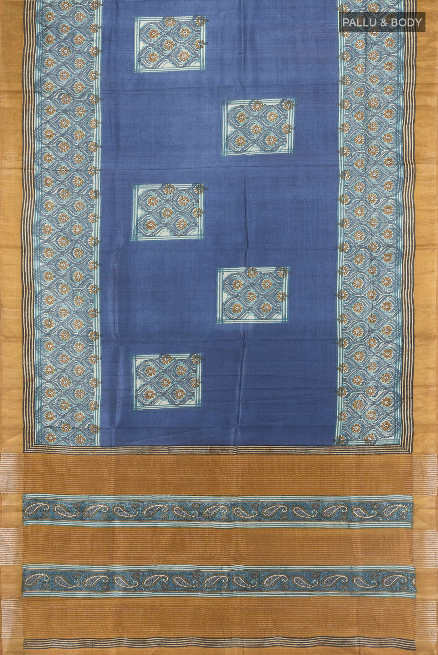 Flat view of Blue Grey Tussar Silk Saree with Floral Print on the body and Zari Border. 