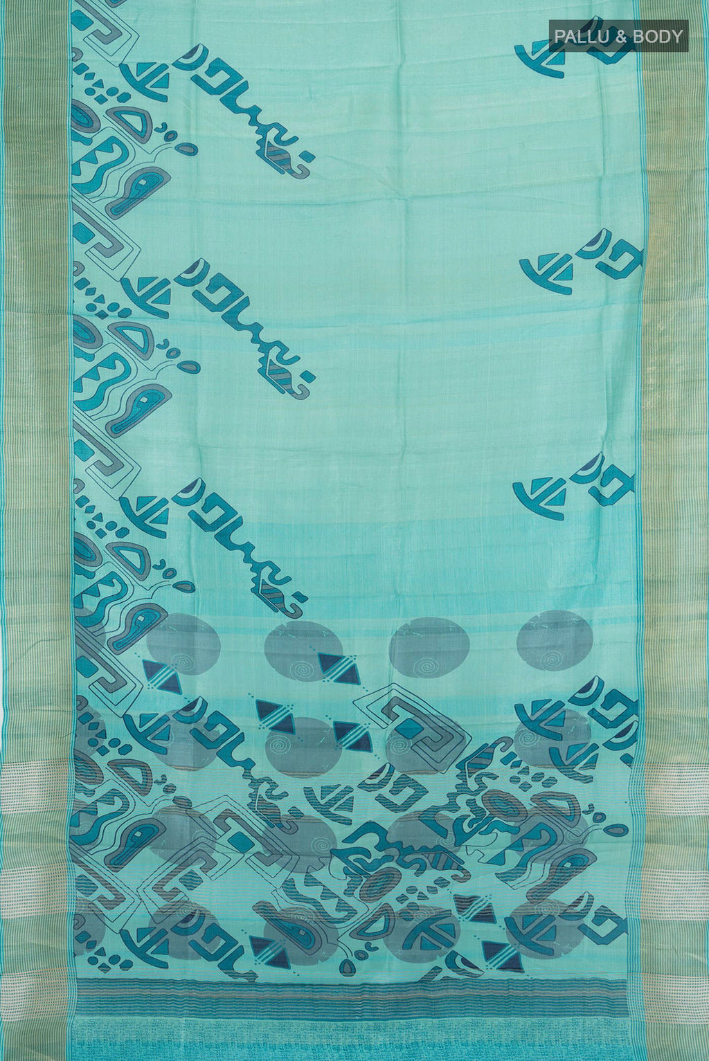 Flat view of Light Blue Tussar Silk Saree with Floral Print on the body and Zari Border. 