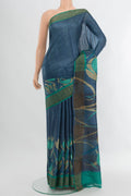 Blue Tussar Silk Saree with Plain Body and Zari Border.  displayed on a mannequin