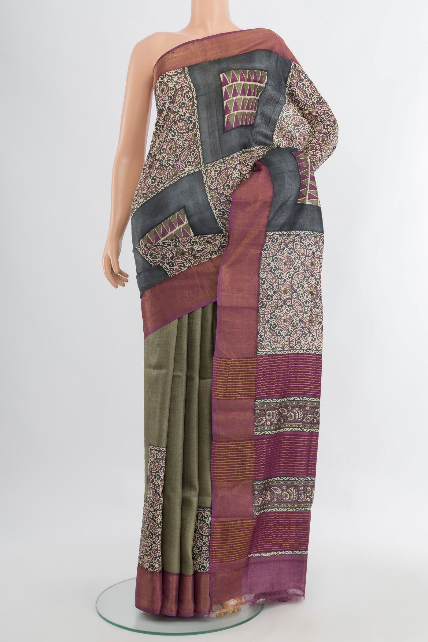 Multi Color Tussar Silk Saree with Floral Print on the body and Silk Border.  displayed on a mannequin
