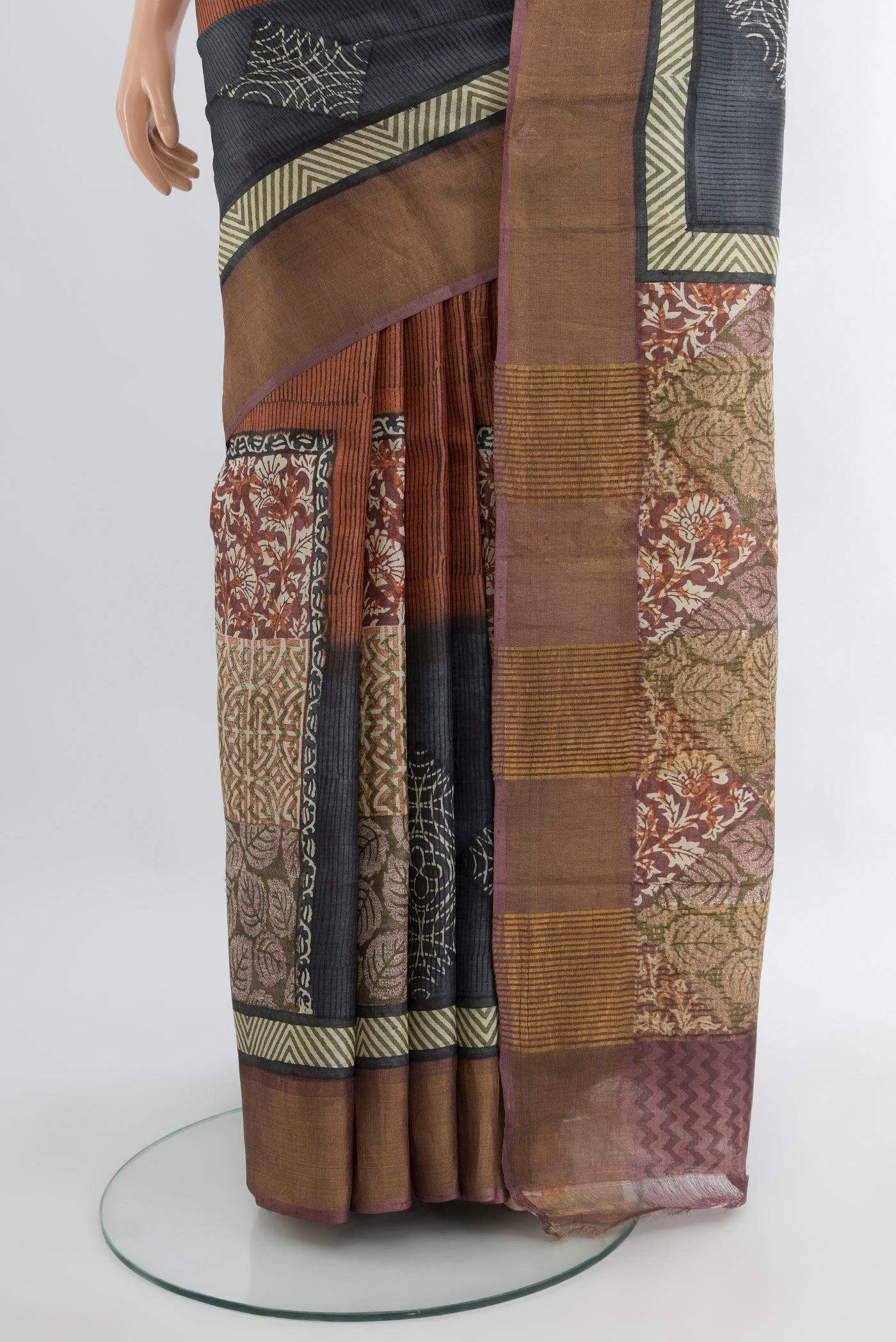Pleats and pallu of Multi Color Tussar Silk Saree with Floral Print on the body and Zari Border. 