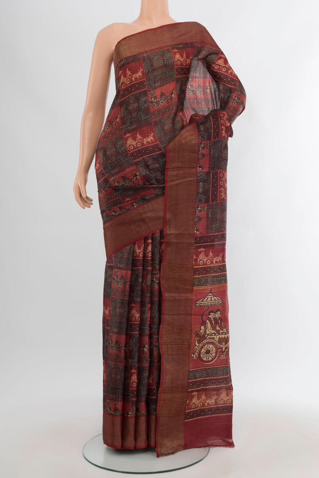 Multi Color Tussar Silk Saree with Printed design on the body and Zari Border.  displayed on a mannequin