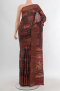 Multi Color Tussar Silk Saree with Printed design on the body and Zari Border.  displayed on a mannequin