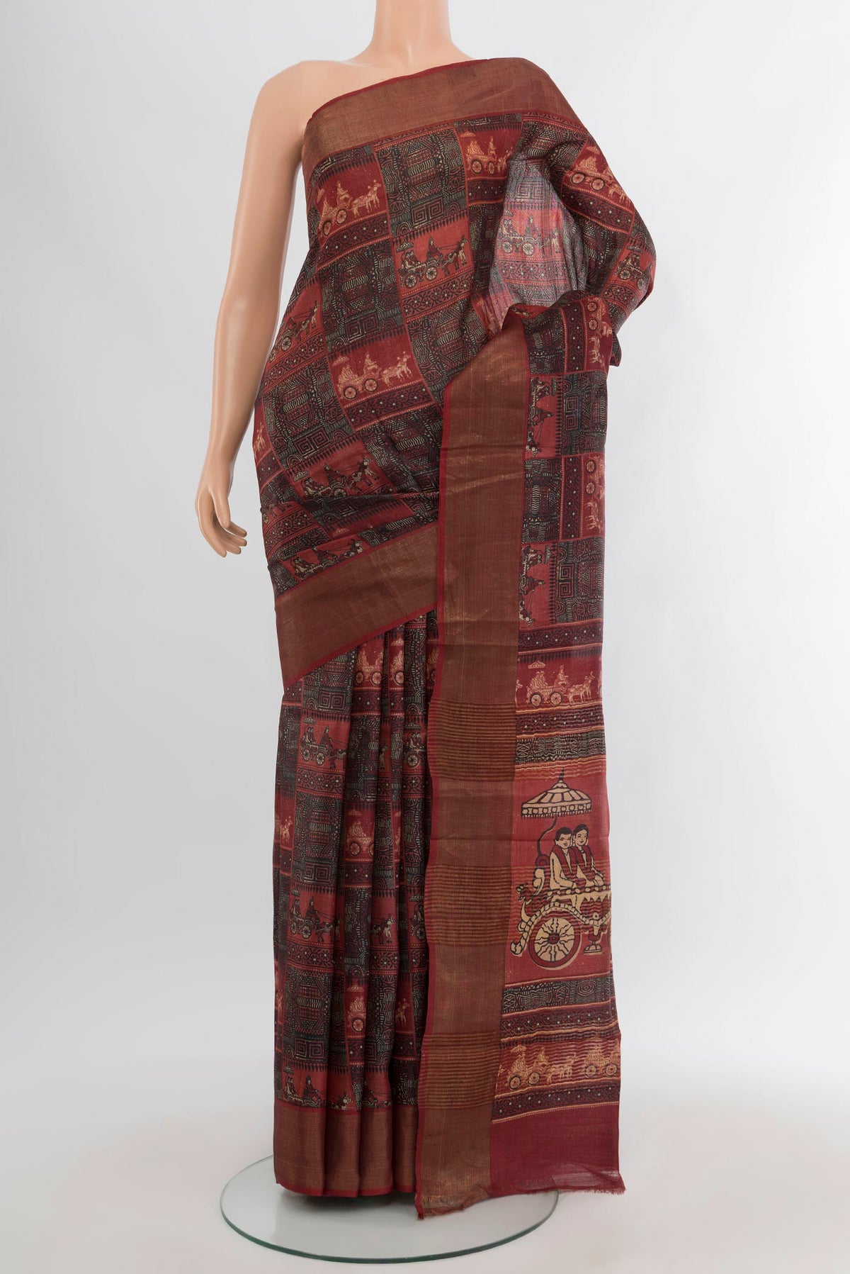 Multi Color Tussar Silk Saree with Printed design on the body and Zari Border.  displayed on a mannequin