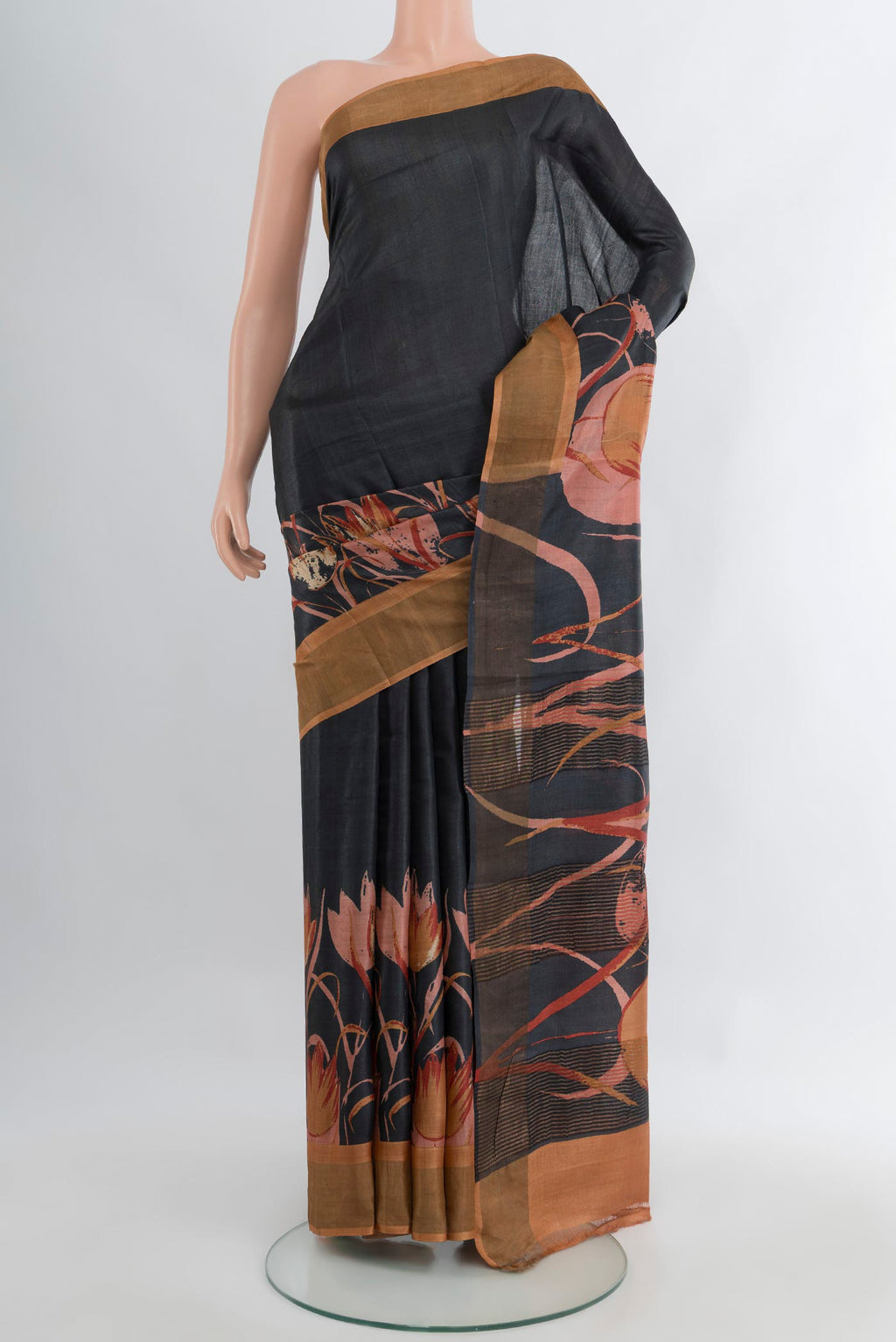 Black Tussar Silk Saree with Plain Body and Fancy Border.  displayed on a mannequin