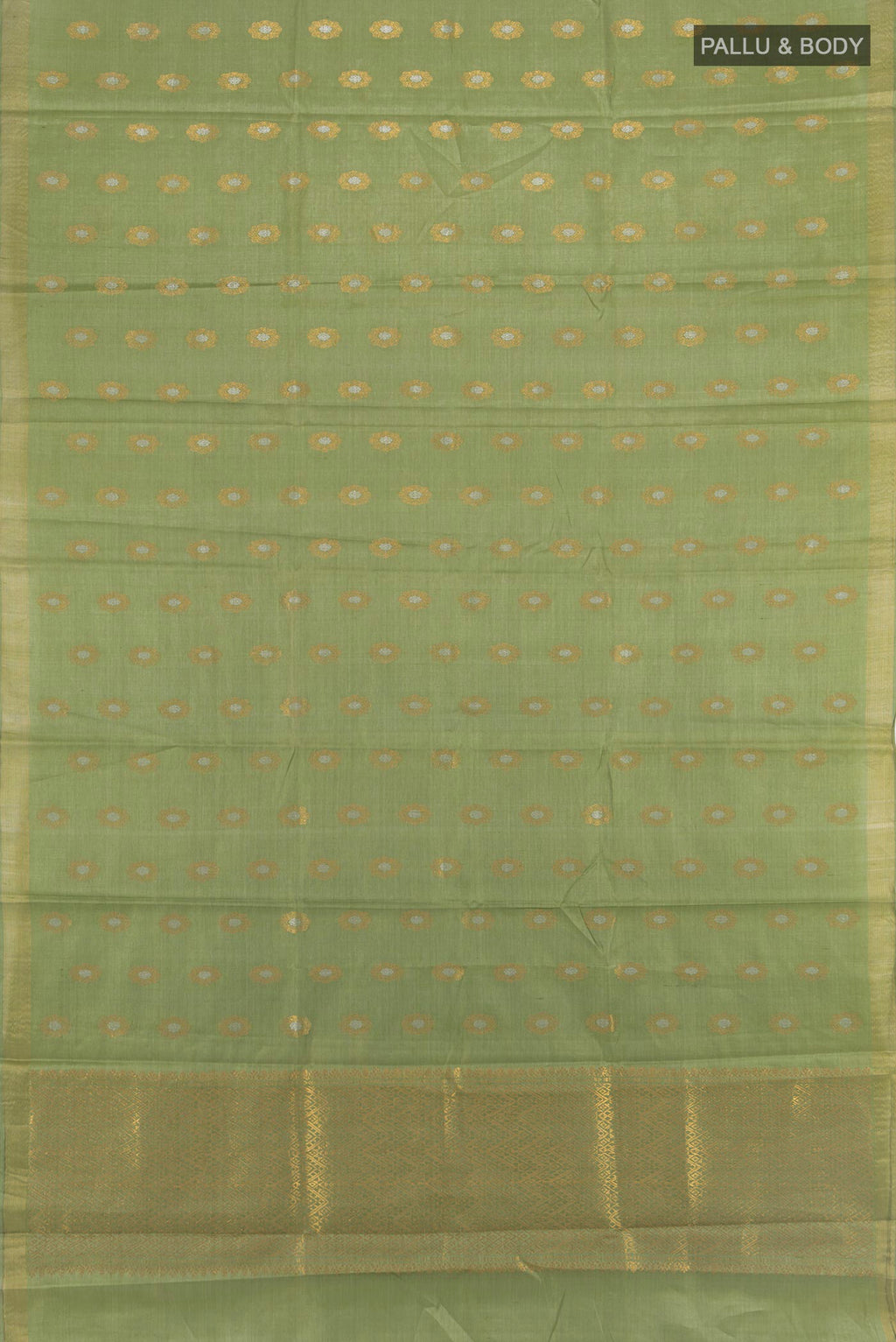 Flat view of Pista Green Tussar Silk Saree with Zari Butta on the body and Zari Border. 