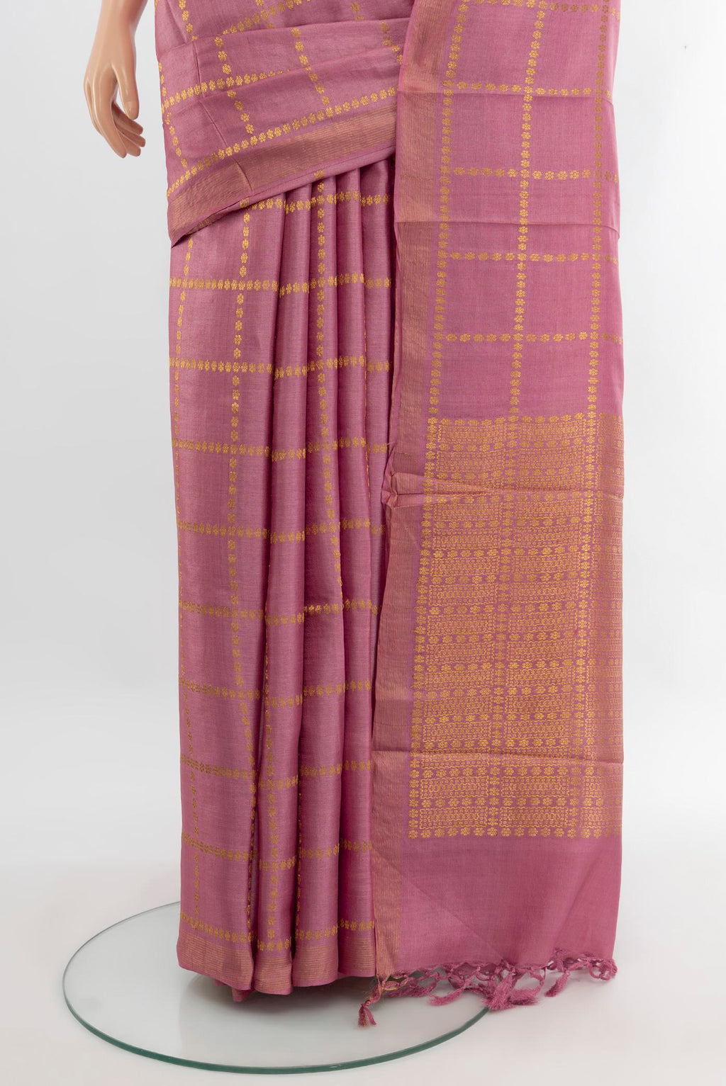 Pleats and pallu of Pink Tussar Silk Saree with Checked design on the body and Thread Border. 