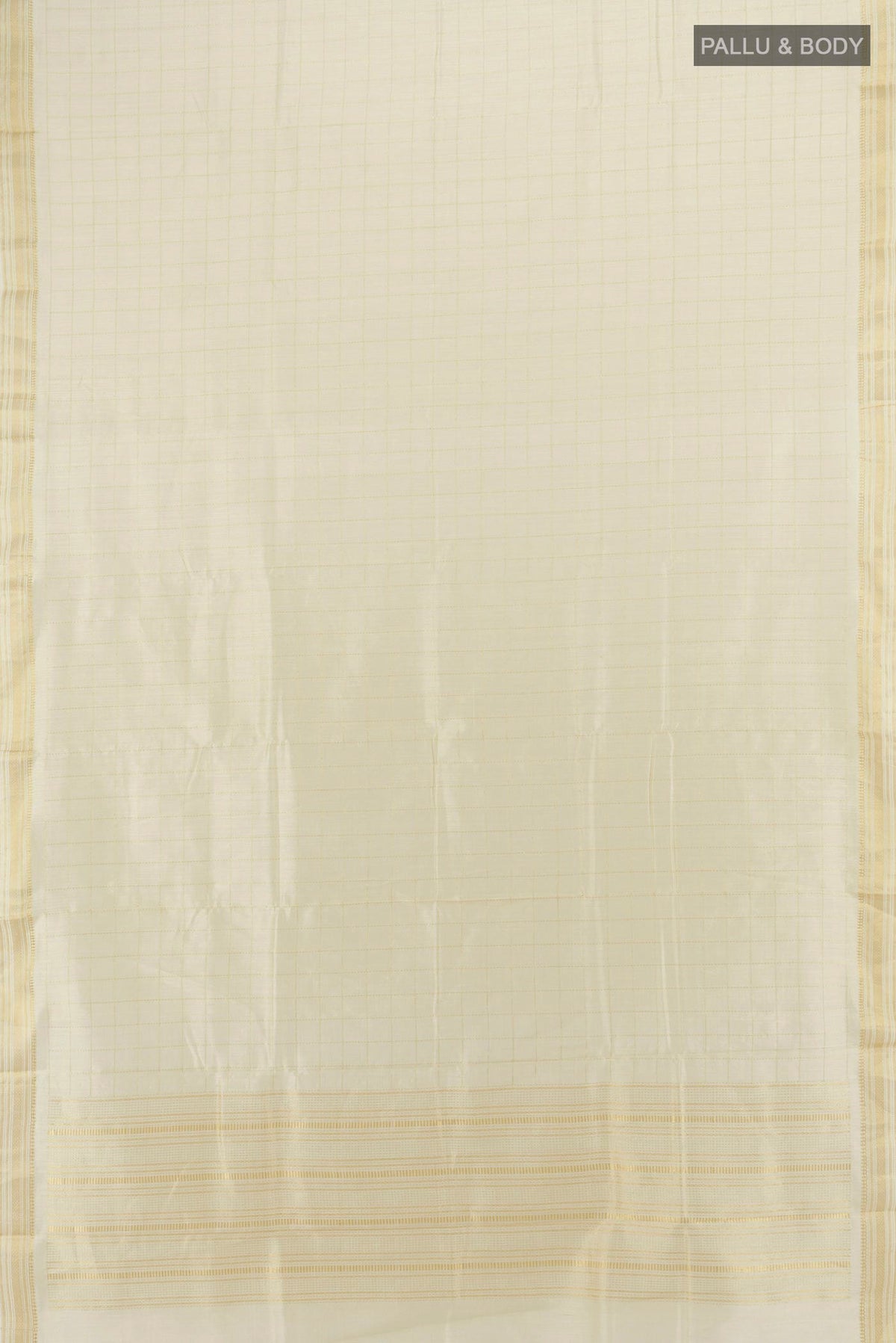 Flat view of Cream Tussar Saree with Checked design on the body and Zari Border. 