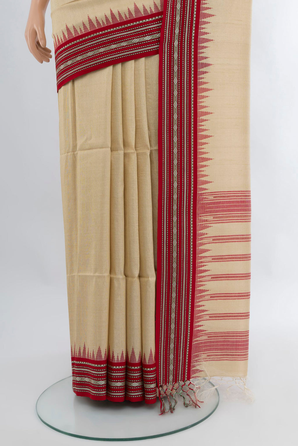 Pleats and pallu of Cream Tussar Silk Saree with Plain Body and Thread Border. 