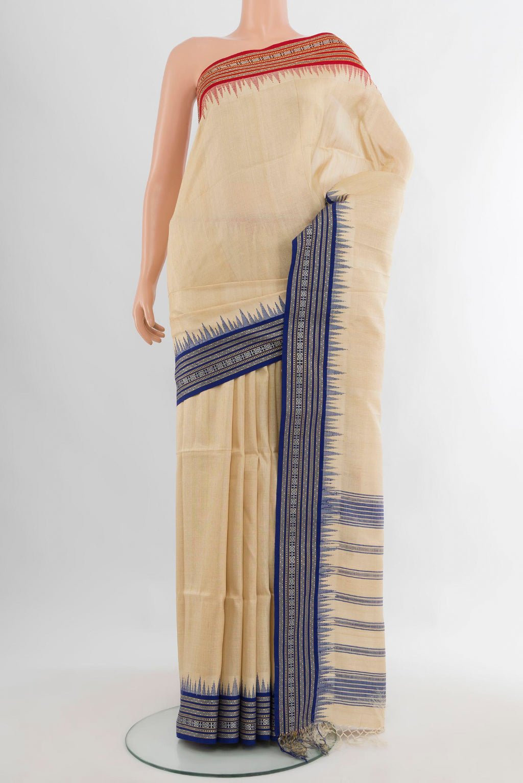 Cream Tussar Saree with Plain Body and Temple Border.  displayed on a mannequin