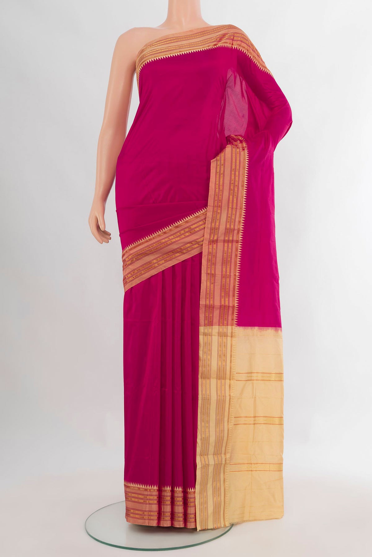 Pure Silk Dark Pink Narayanpet Saree with Plain Body and Zari Border.  displayed on a mannequin