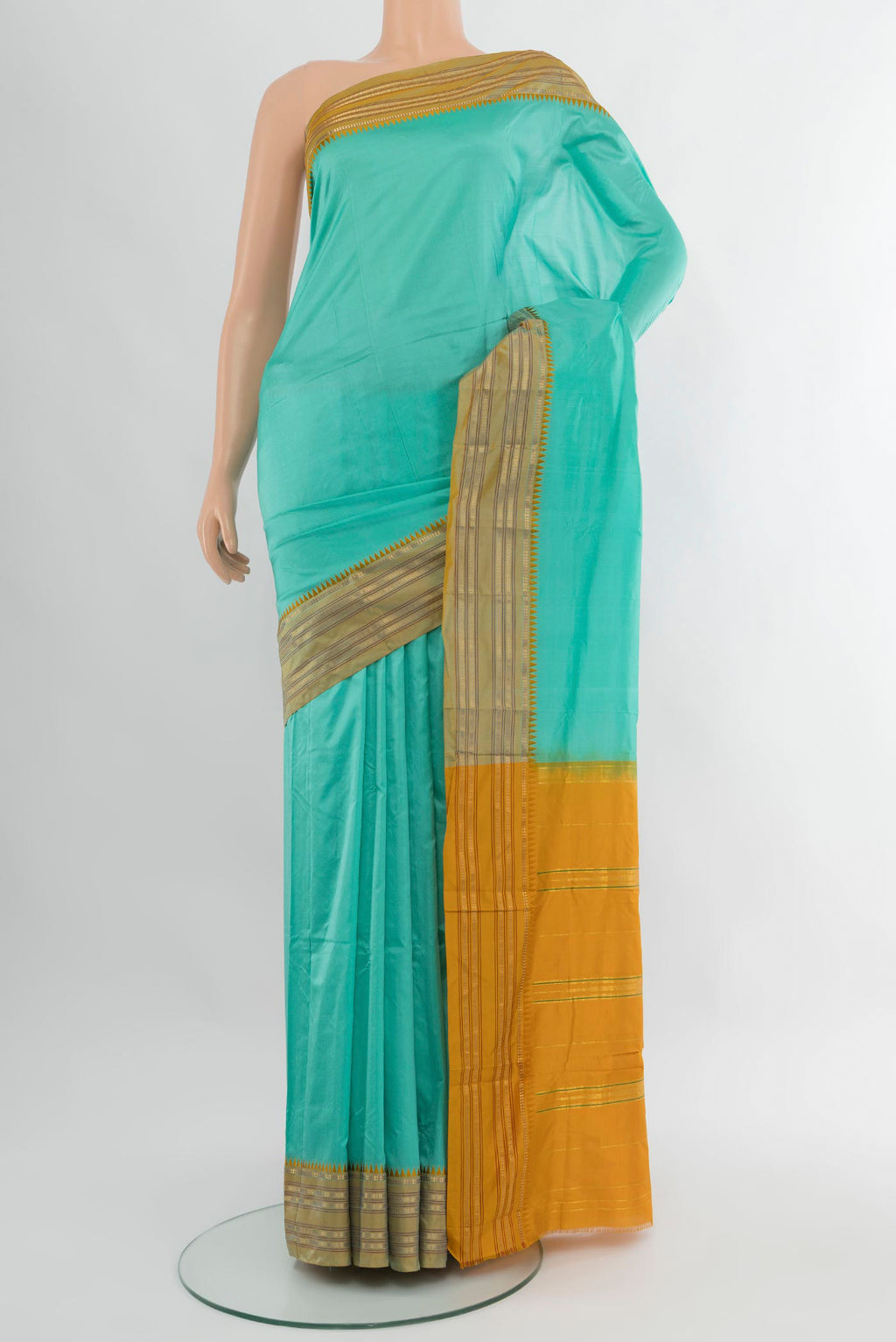 Sky Blue Narayanpet Silk Saree with Plain Body and Zari Border.  displayed on a mannequin