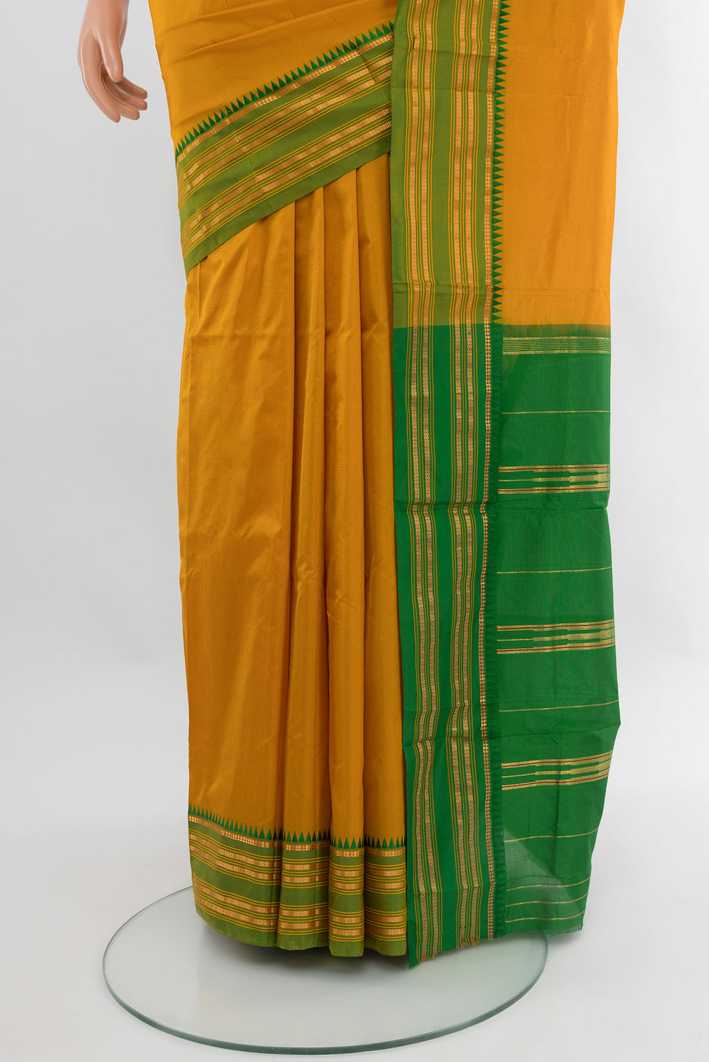 Pleats and pallu of Mustard Narayanpet Silk Saree with Plain Body and Zari Border. 