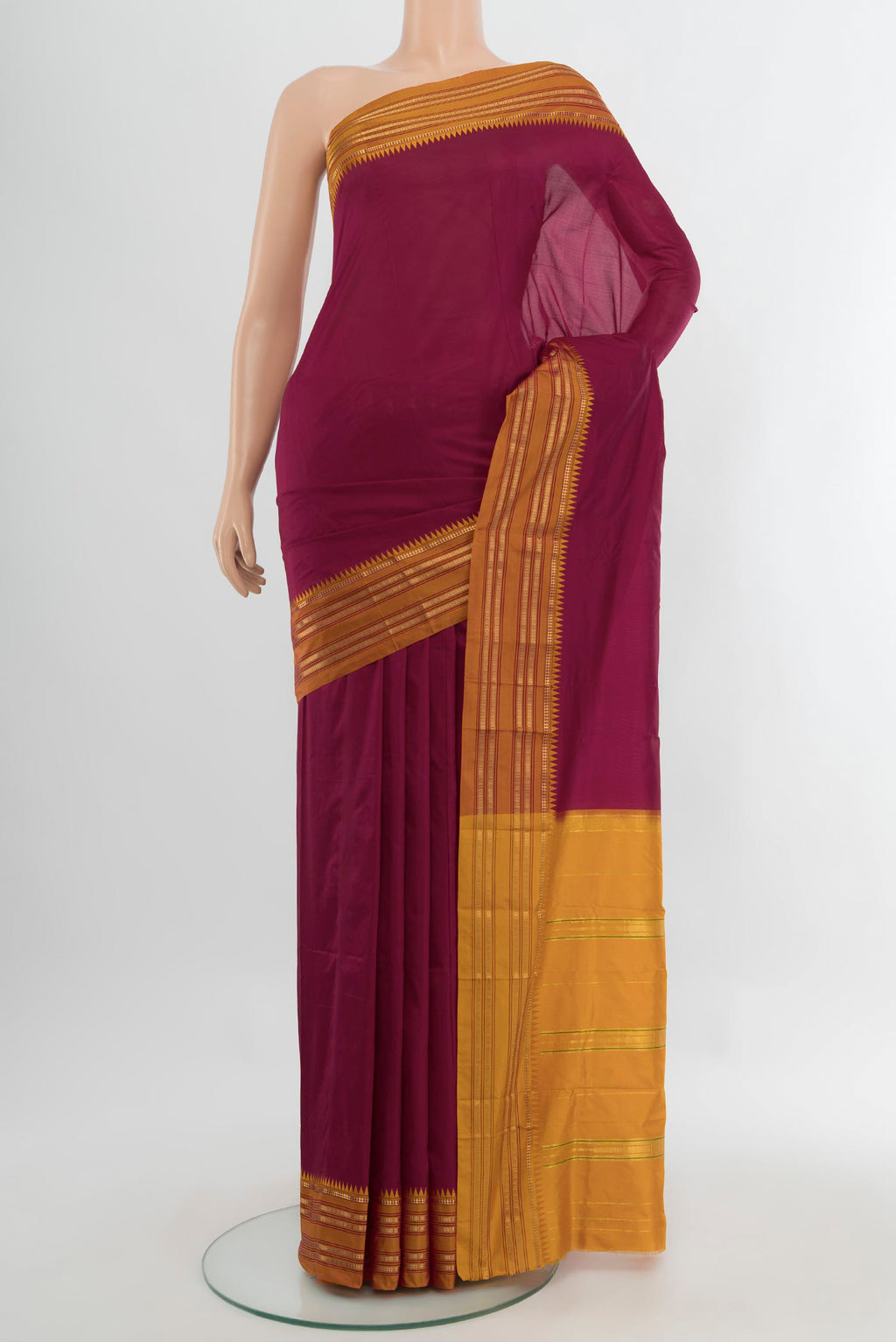 Maroon Narayanpet Silk Saree with Plain Body and Silk Border.  displayed on a mannequin