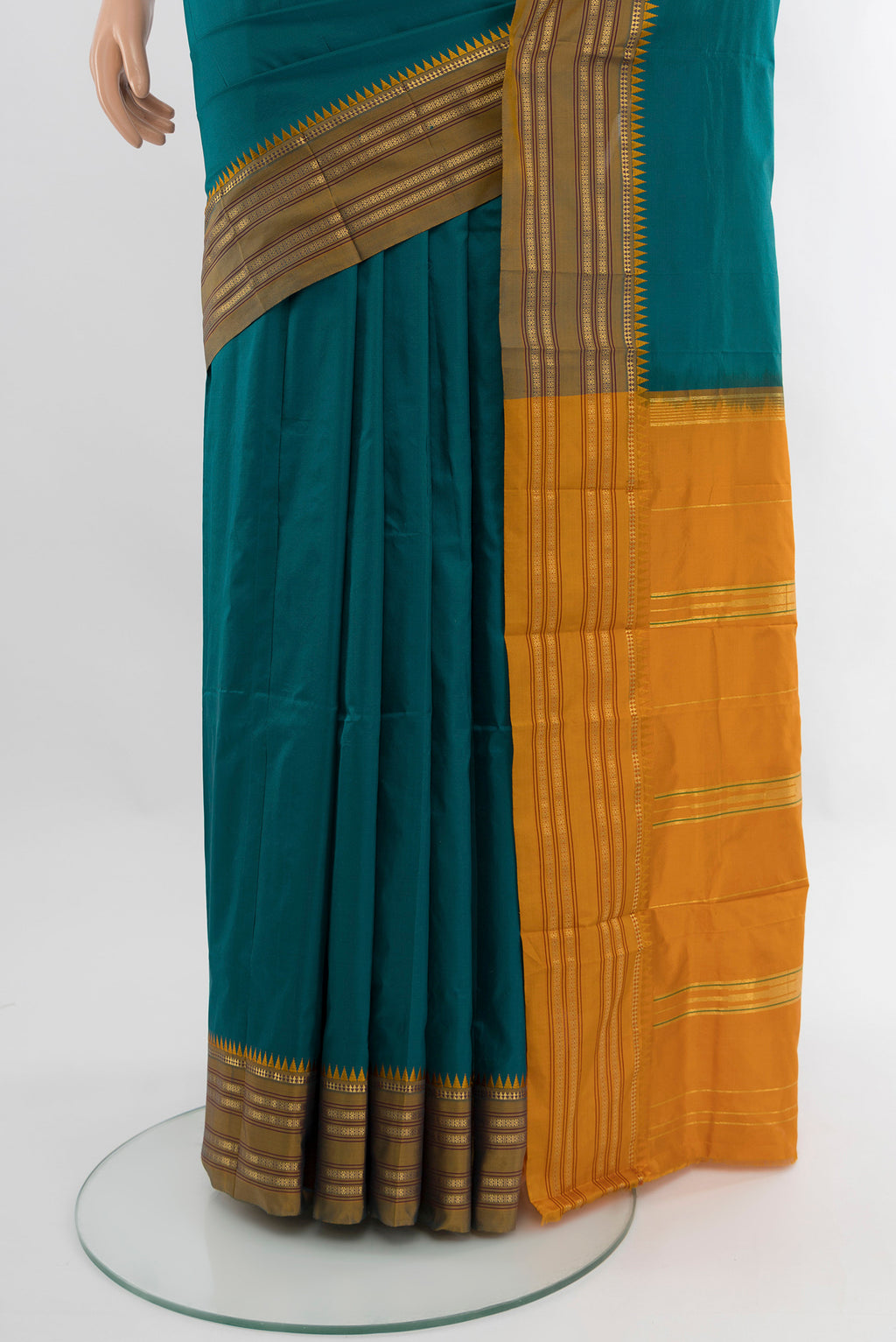 Pleats and pallu of Peacock Blue Narayanpet Silk Saree with Plain Body and Zari Border. 
