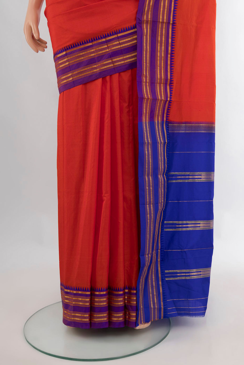 Pleats and pallu of Pure Silk Brick Orange Narayanpet Saree with Plain Body and Zari Border. 