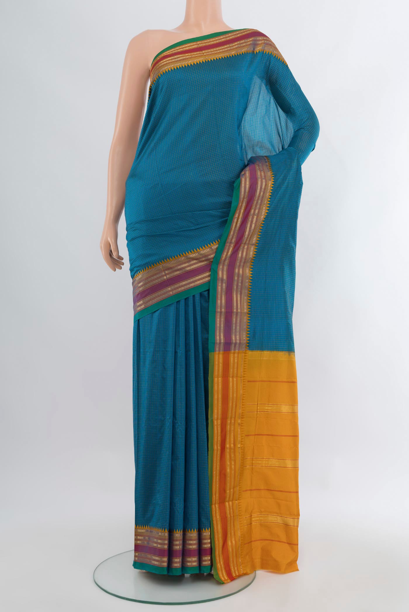 Blue Narayanpet Silk Saree with Checked design on the body and Zari Border.  displayed on a mannequin