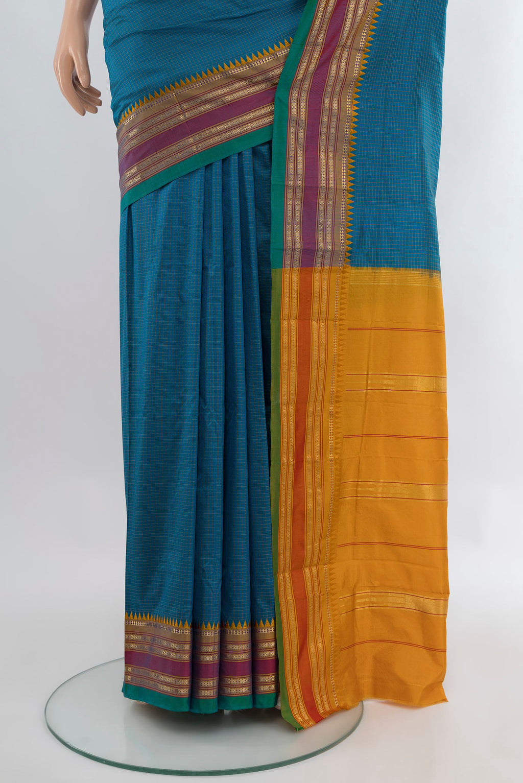 Pleats and pallu of Blue Narayanpet Silk Saree with Checked design on the body and Zari Border. 