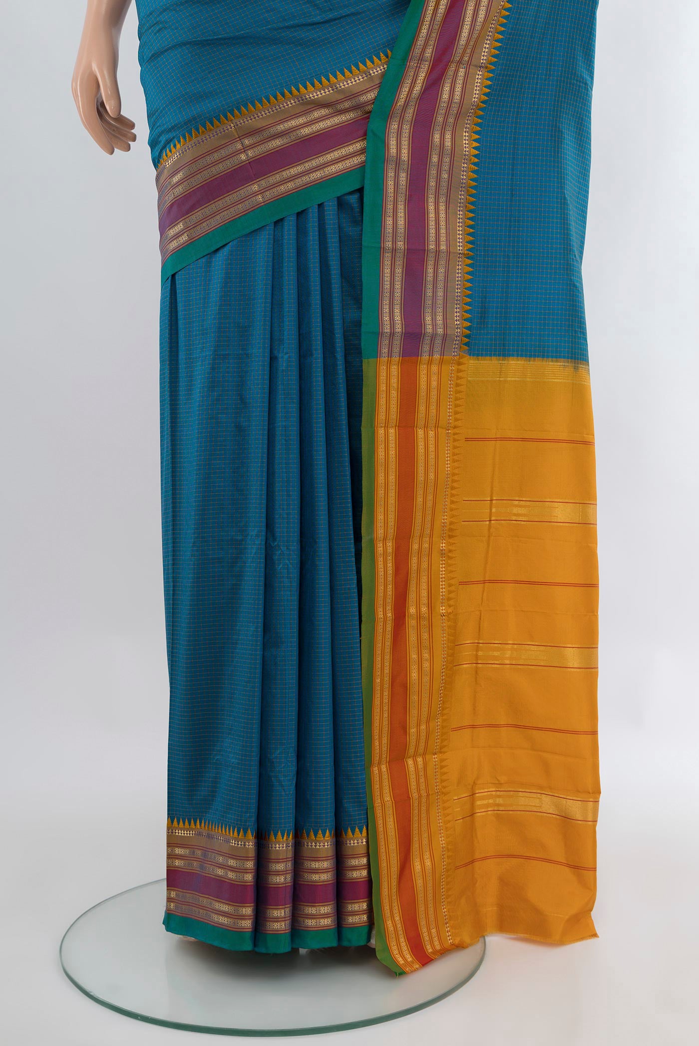 Pleats and pallu of Blue Narayanpet Silk Saree with Checked design on the body and Zari Border. 